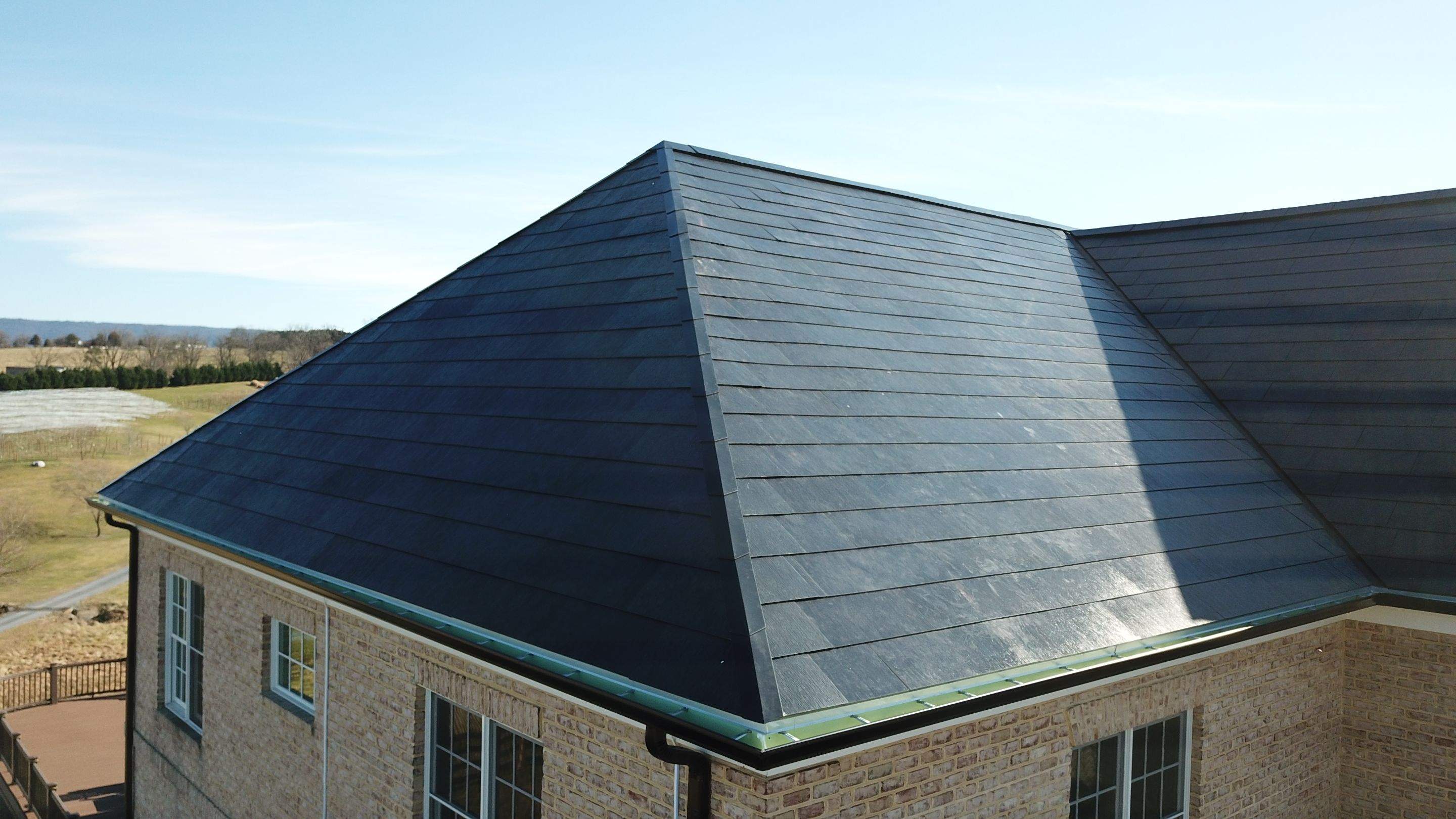 Tesla Solar Roof Replacement  by American Home Contractors