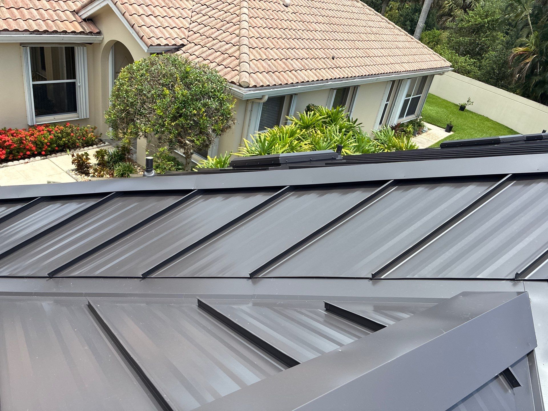 24ga 1.5" Mechanical Seam Dark Bronze by Total Roofing System The Metal Roof Experts