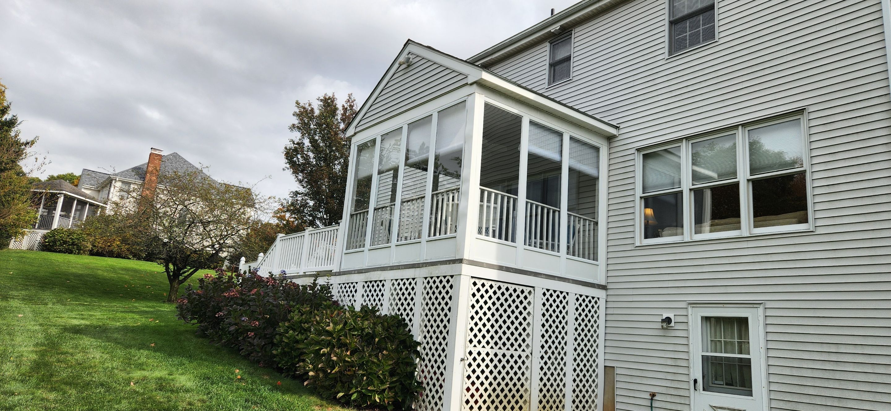 Summer Space Porch Enclosure Transformation by DiGiorgi Roofing and Siding Inc