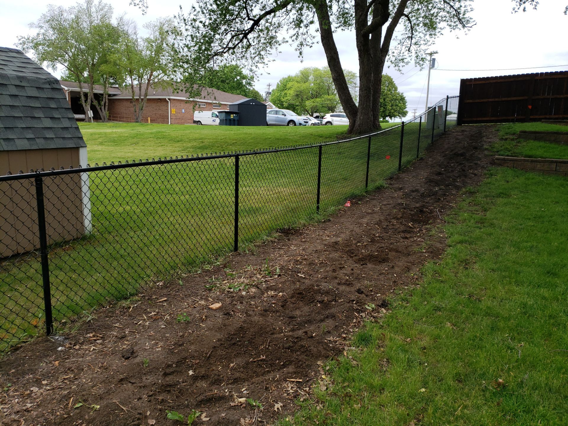Chain Link and Cedar Privacy in Grundy Center by Perfect Picket Fence and Stain