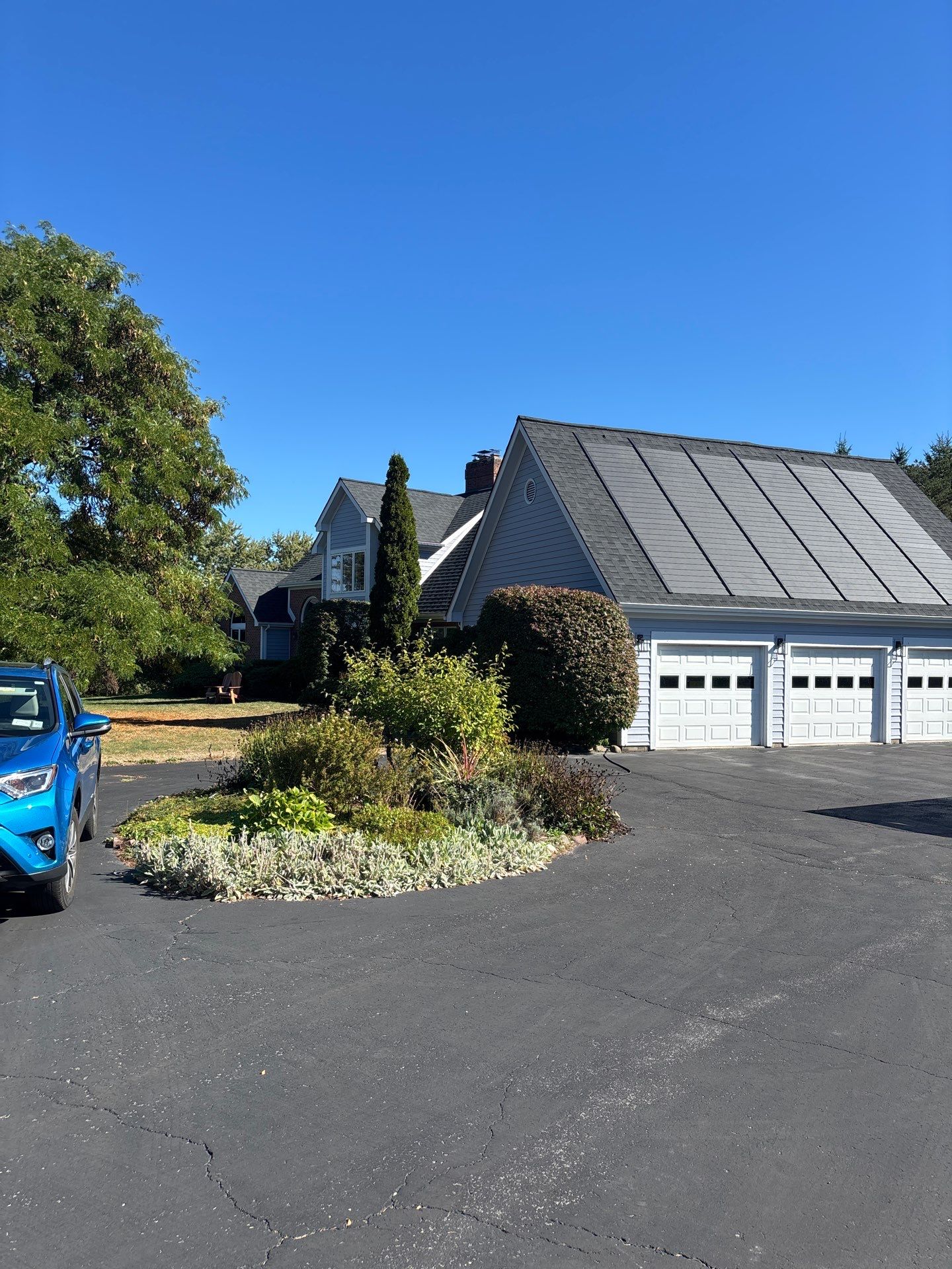 GAF Timberline Solar Roof Installation in Pittsford, NY by American Home Contractors