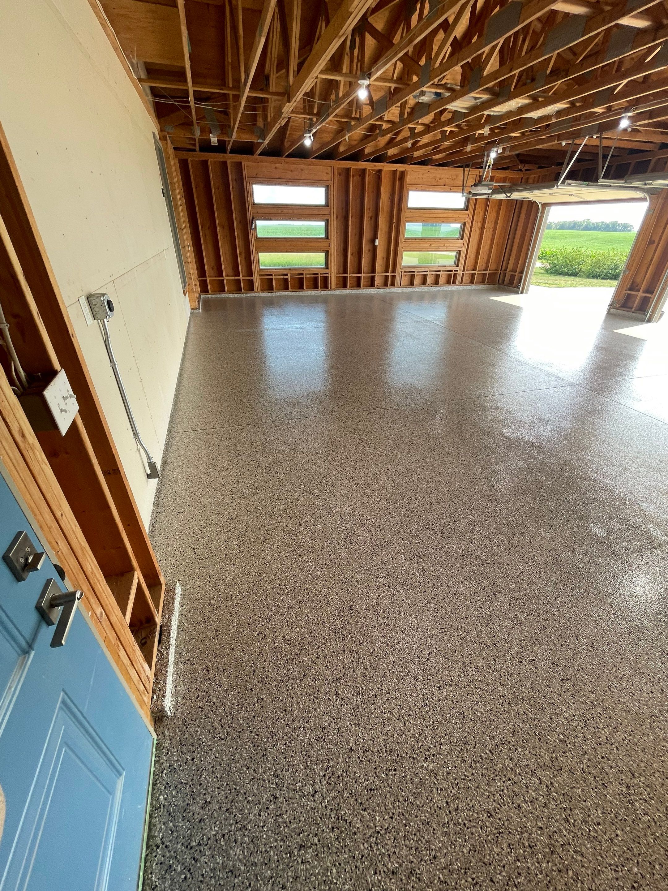 Cabin Fever Coating for Detached Garage in Dell Rapids by Select Painting, Coatings & Garage Cabinets
