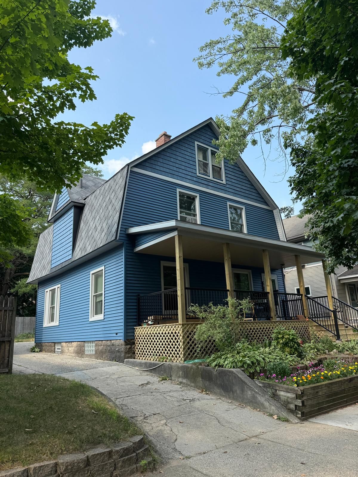 SIDING, DECK AND NEW PORCH  by Avalon Roofing and Exteriors