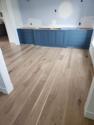  7 inch wide engineered  White Oak site sand and finish