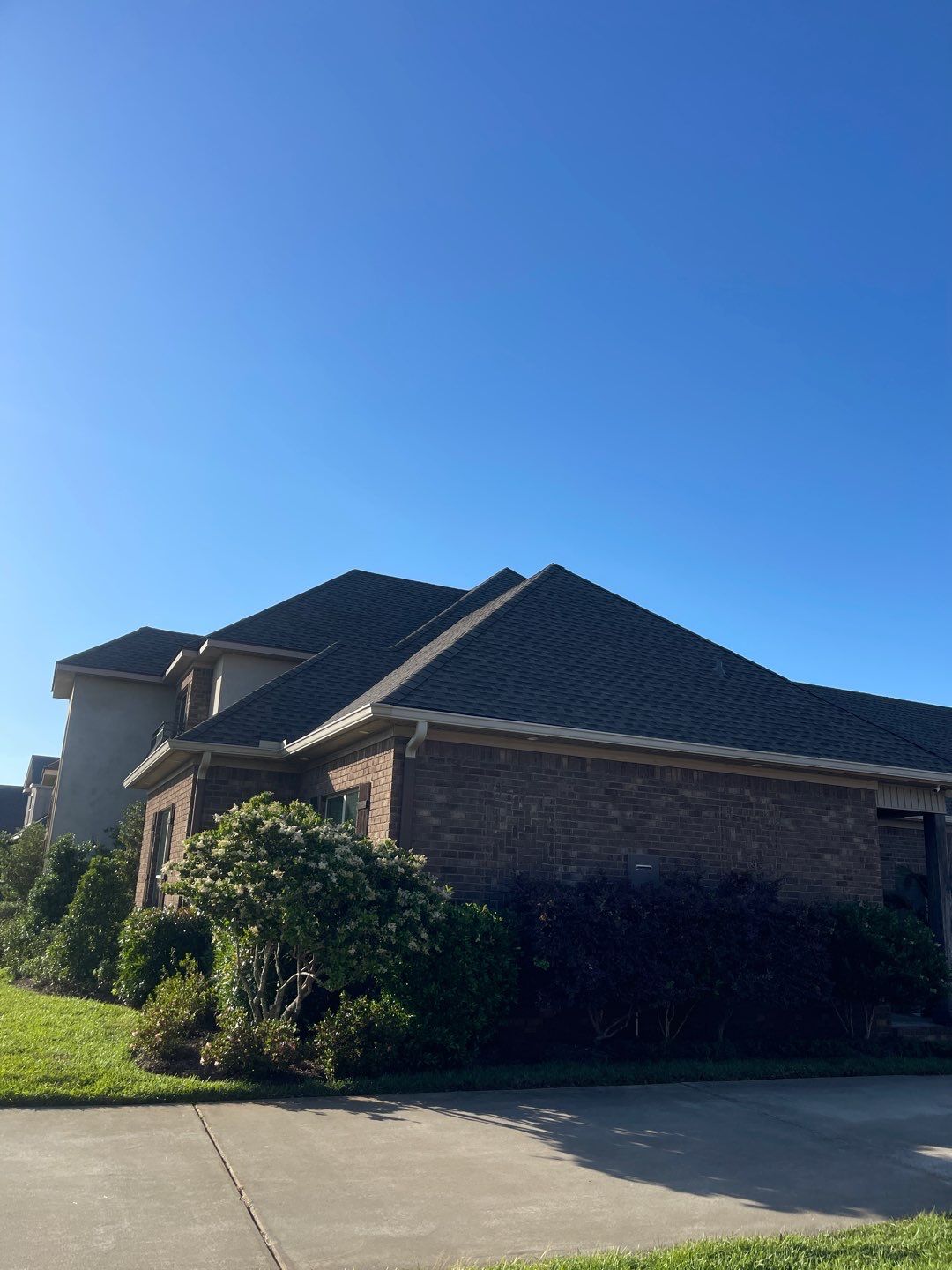 Residential Roofing Installation using Roof Replacement by American Roofing & Construction LLC