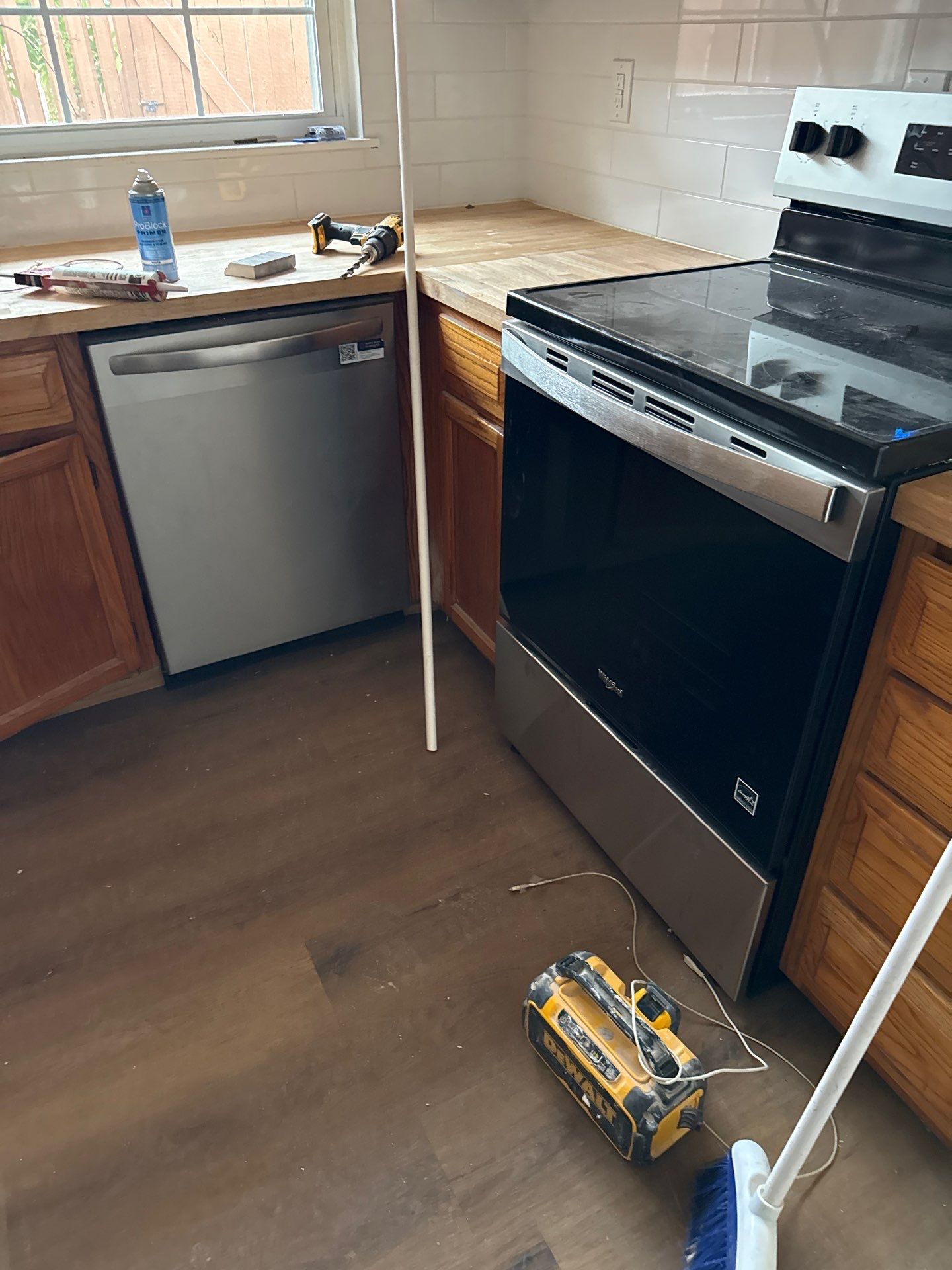 Complete Home Remodel Featuring Custom Kitchen and Wood-Look Plank Flooring by MAJO