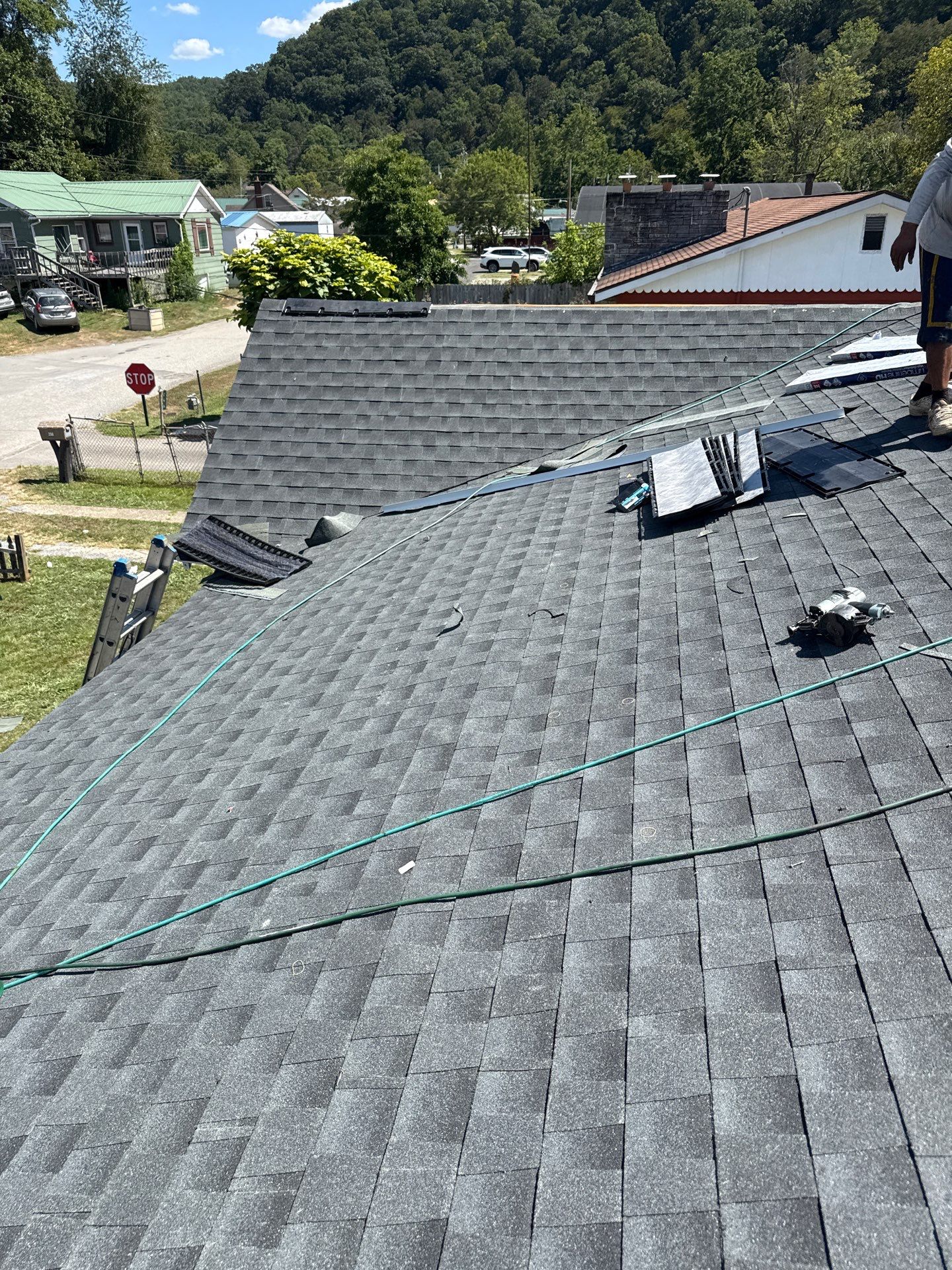 Residential Roofing Installation using GAF Timberline HDZ Charcoal by Rainstoppers Roofing