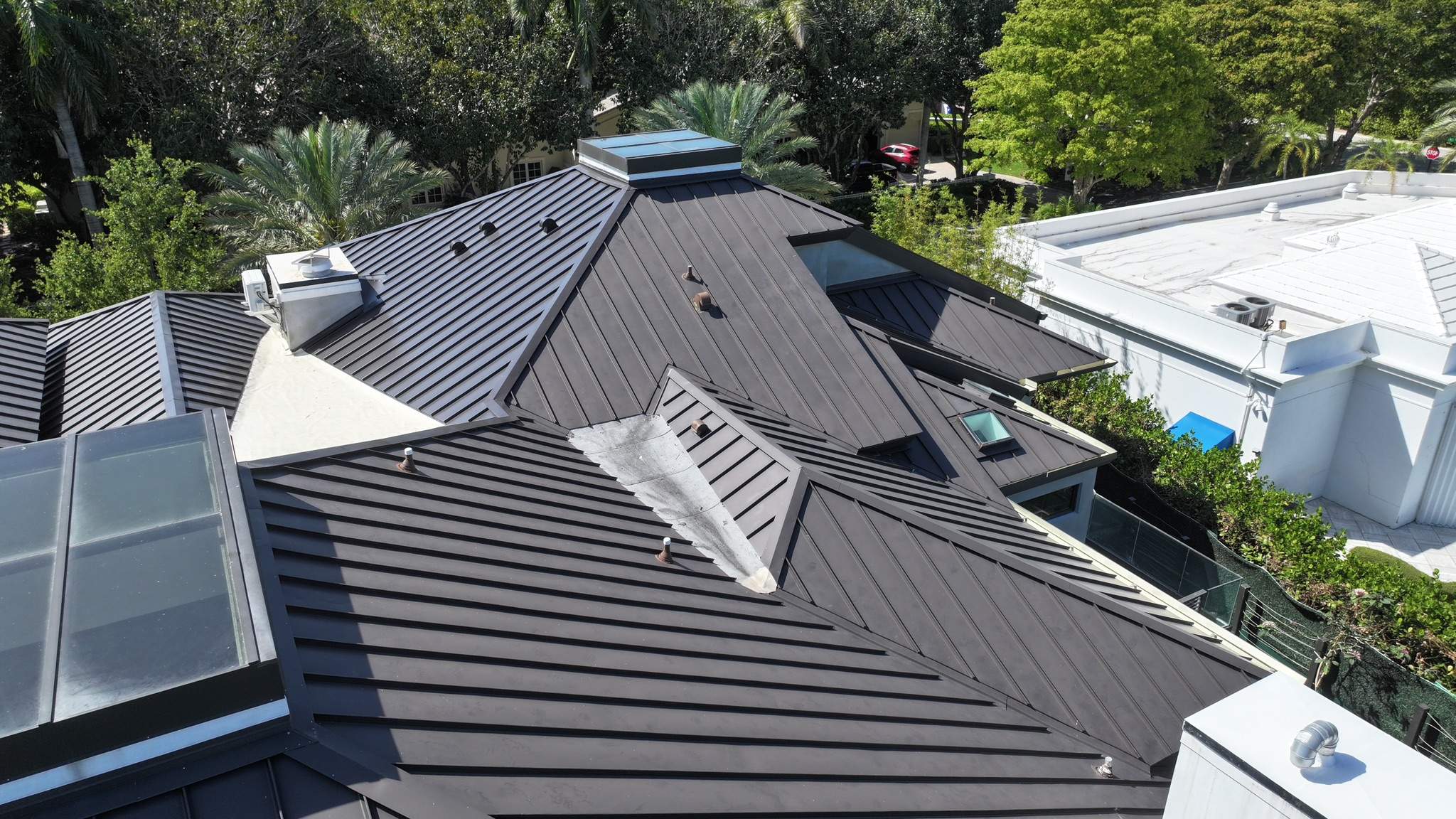 24ga 1.5" Mechanical Seam Dark Bronze by Total Roofing System The Metal Roof Experts