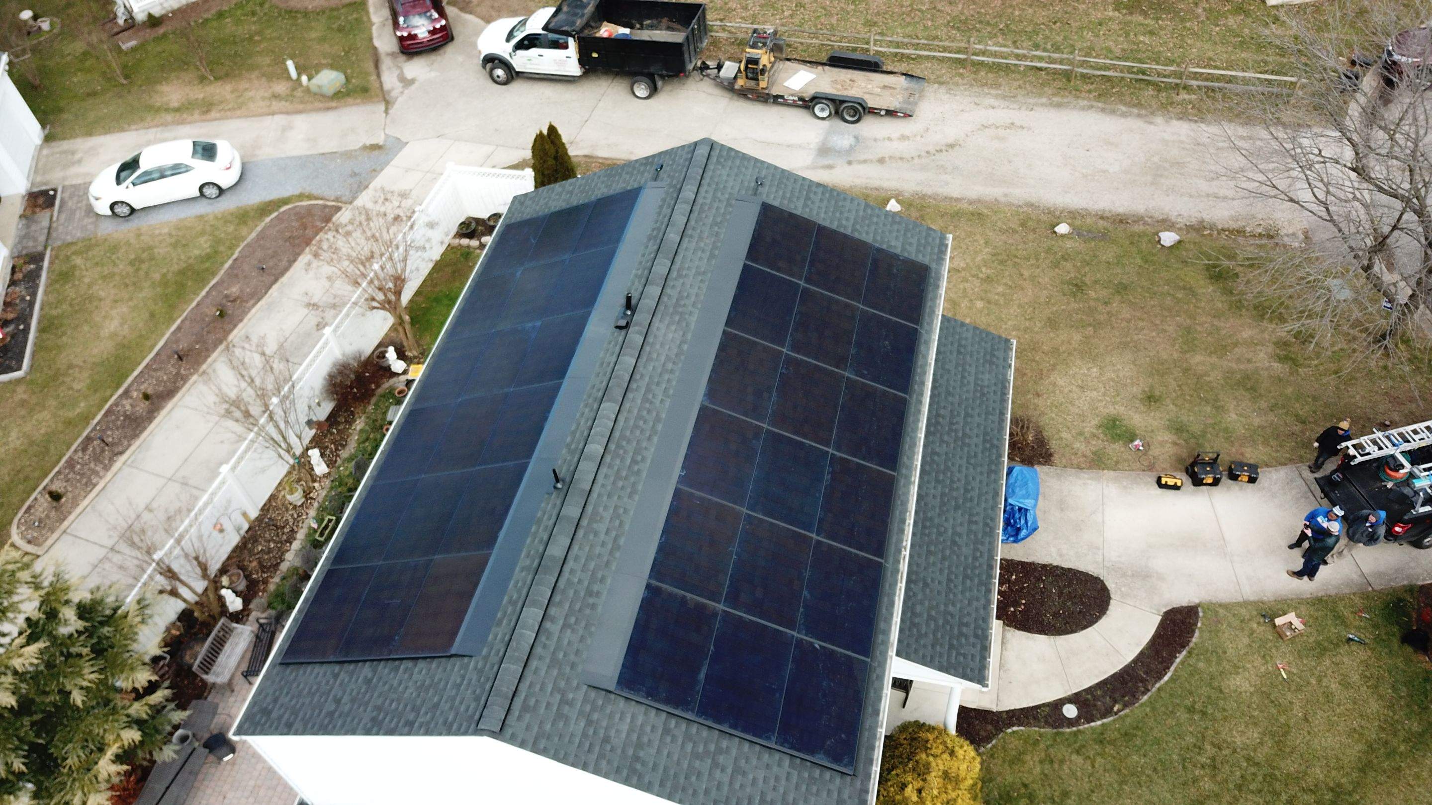 Roof Replacement with GAF Decotech integrated solar panels by American Home Contractors