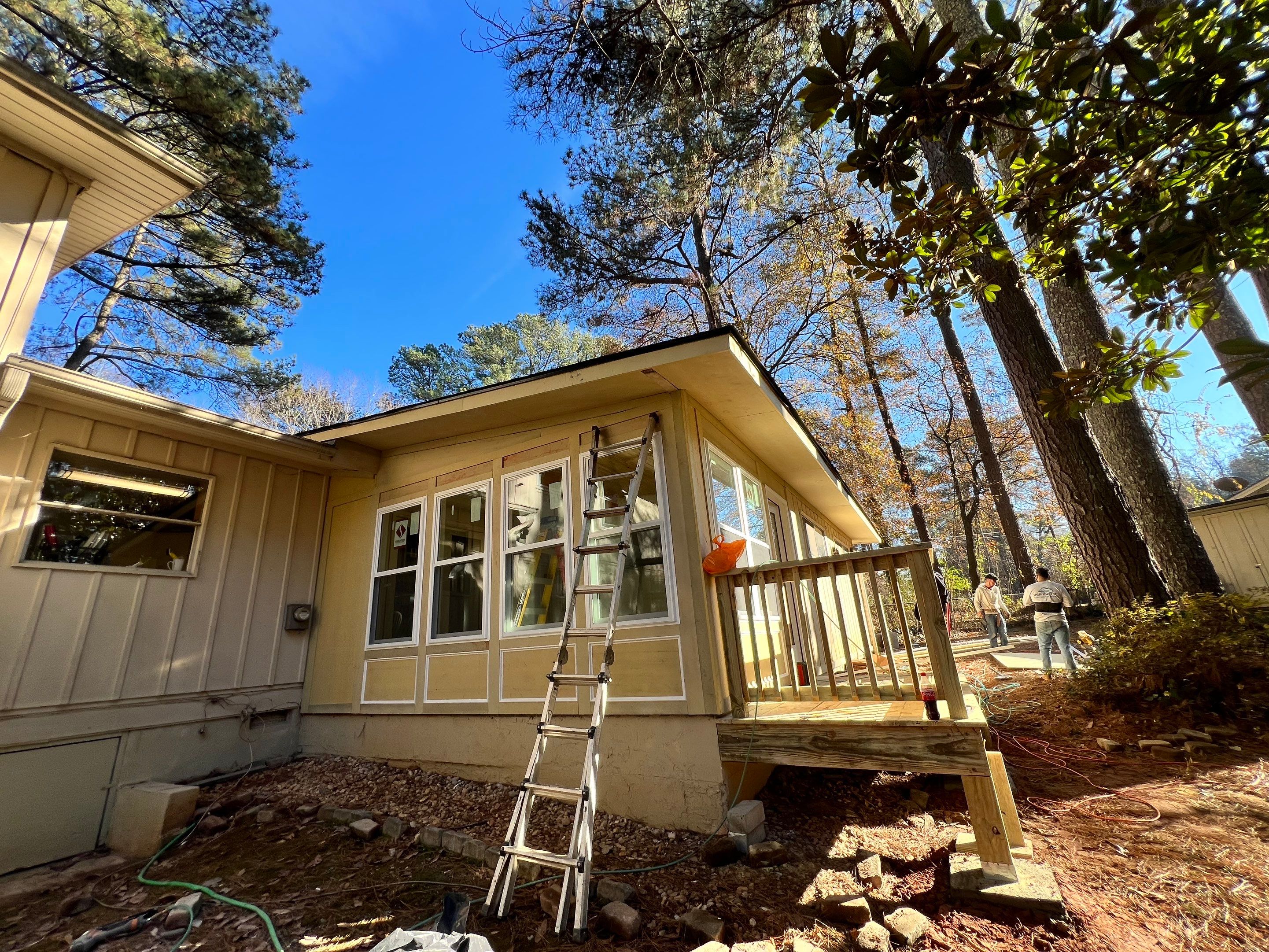 Sunroom Conversion and Pressure Treated Deck Installation in Doraville by Swift Home Renovations