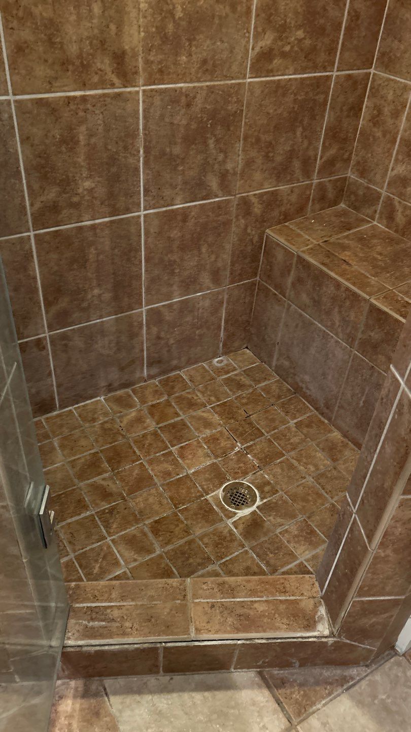 Tile shower and floor by Footprints Floors of Nashville