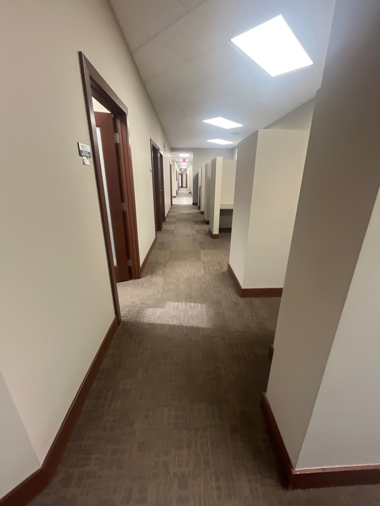 Commercial Office Interior Remodel and Modern Suite Refresh in Sioux Falls by Select Painting, Coatings & Garage Cabinets