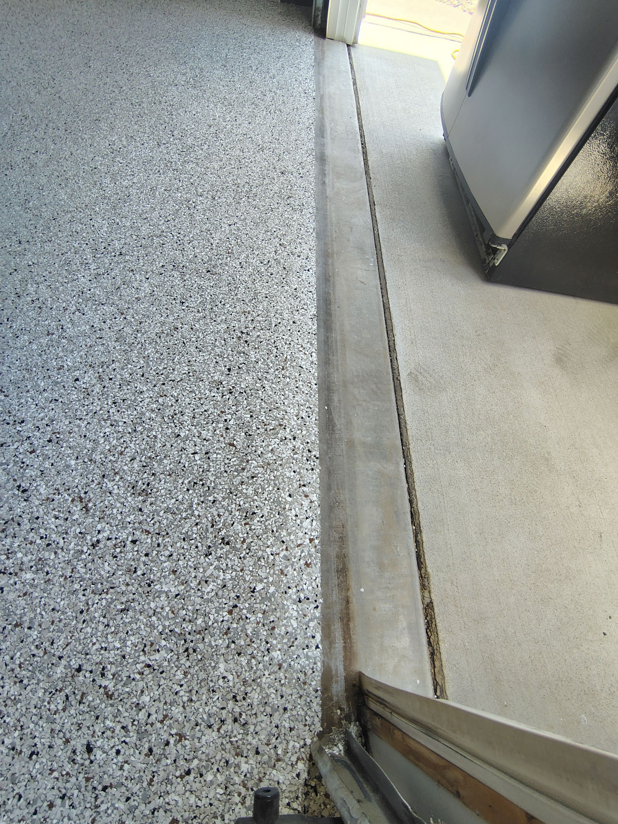 Multi-Car Garage Concrete Coating and Crack Repair in Dell Rapids by Select Painting, Coatings & Garage Cabinets