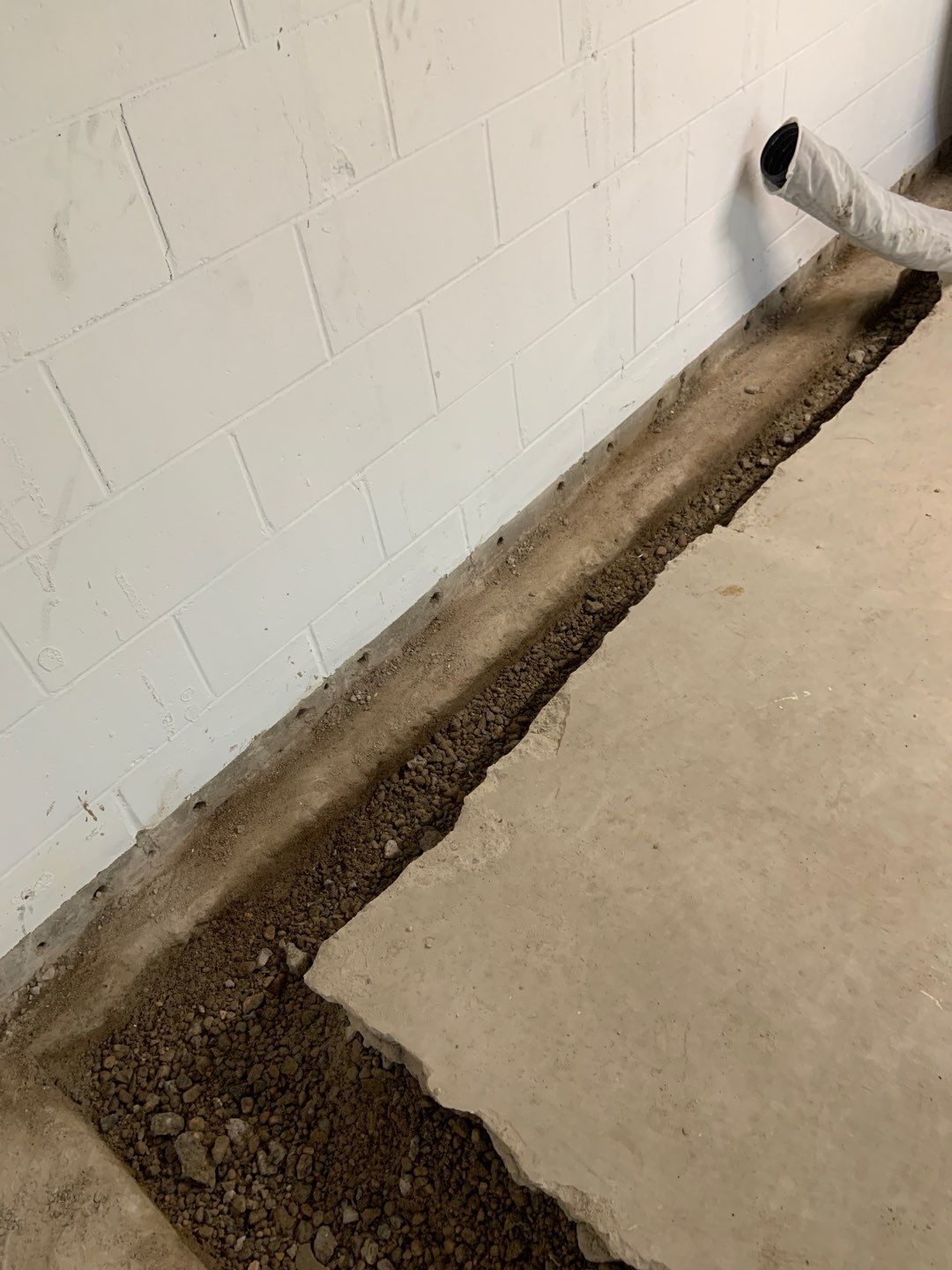 Correcting an Improper Installation for Alan in Chanhassen by Waterproofing Northeast