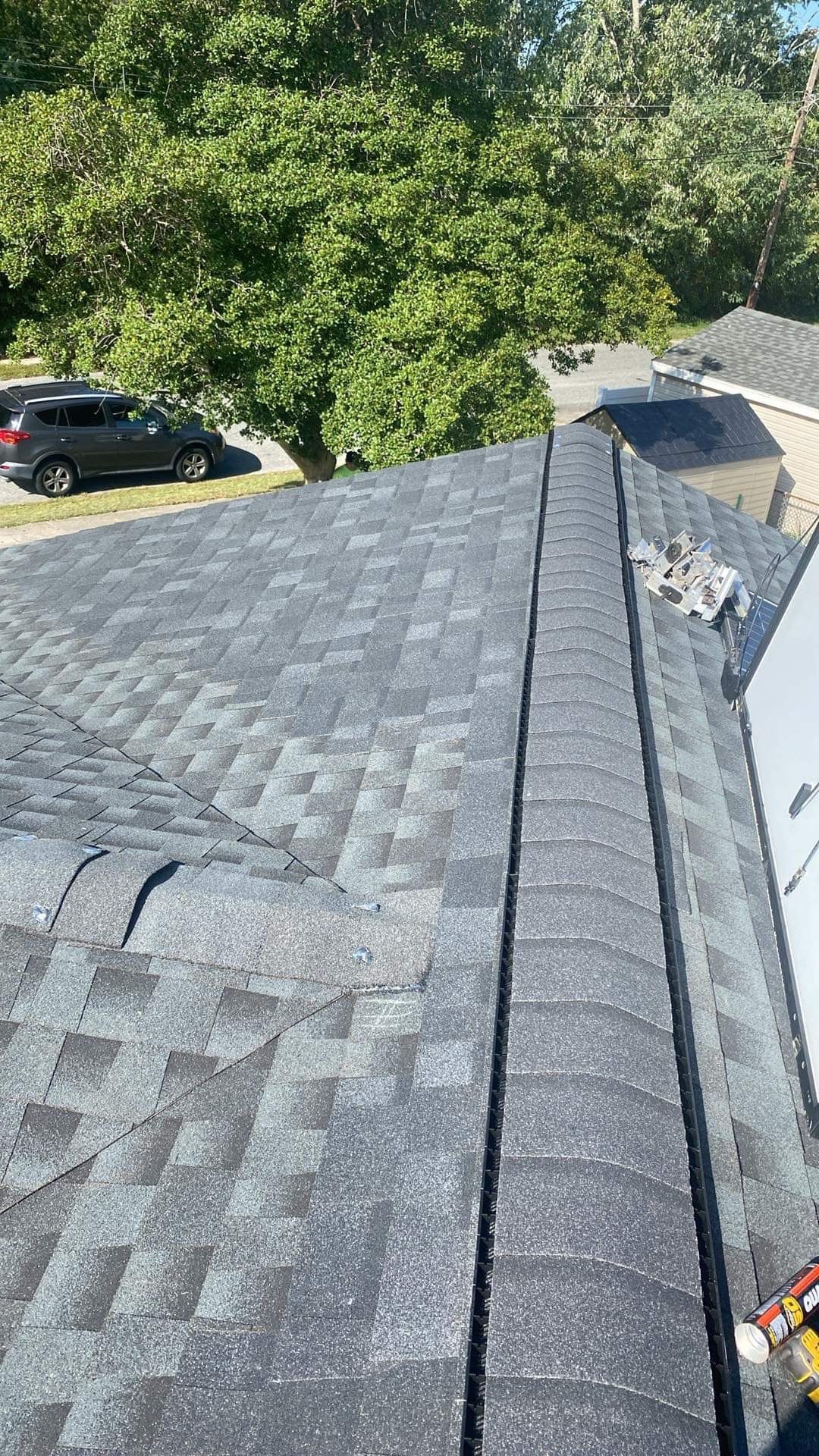 Estate Gray Shingles by Reimagine Roofing