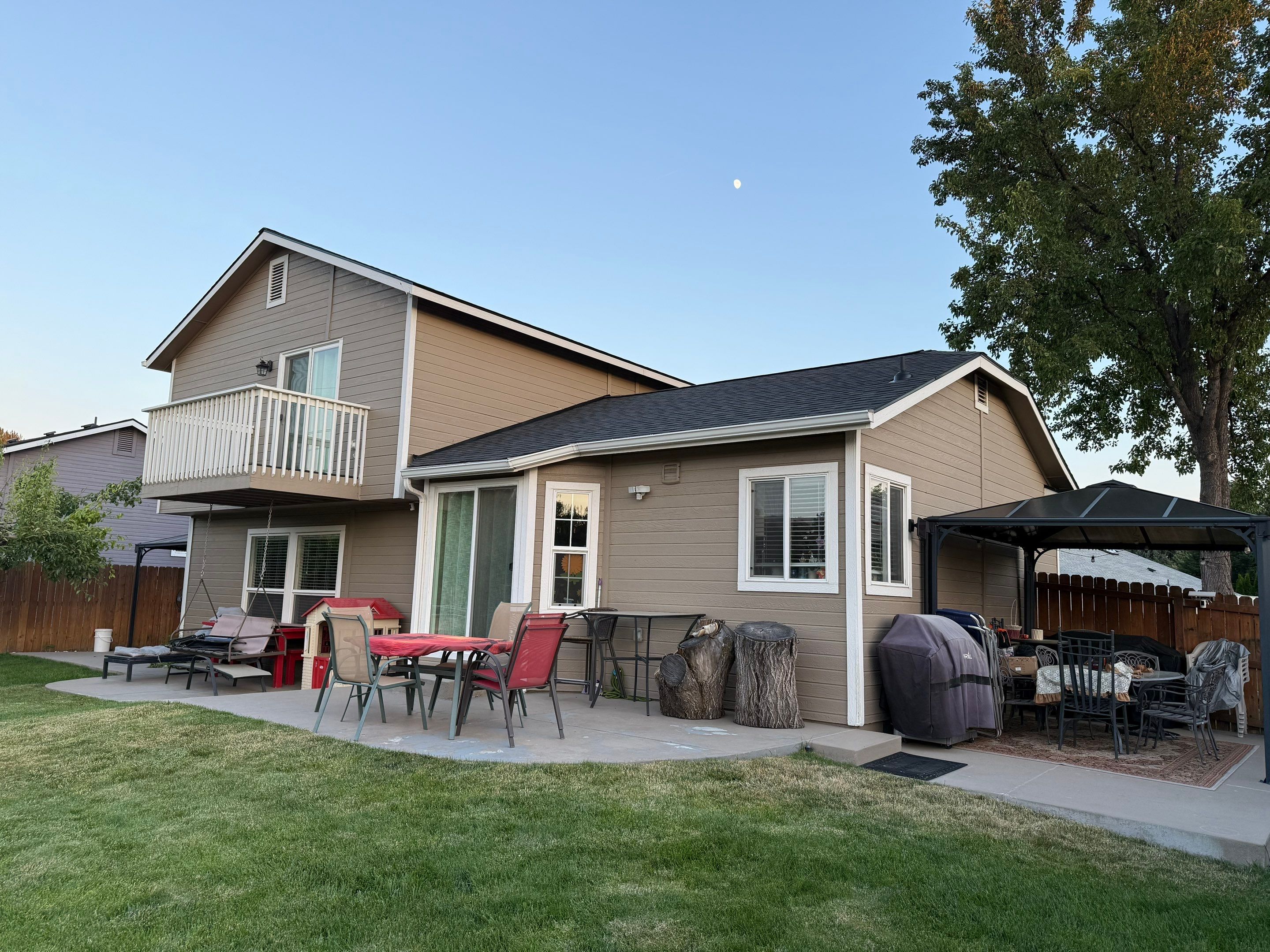 Residential Roof Replacement and Seamless Gutter Installation in Boise by Olive Roofing