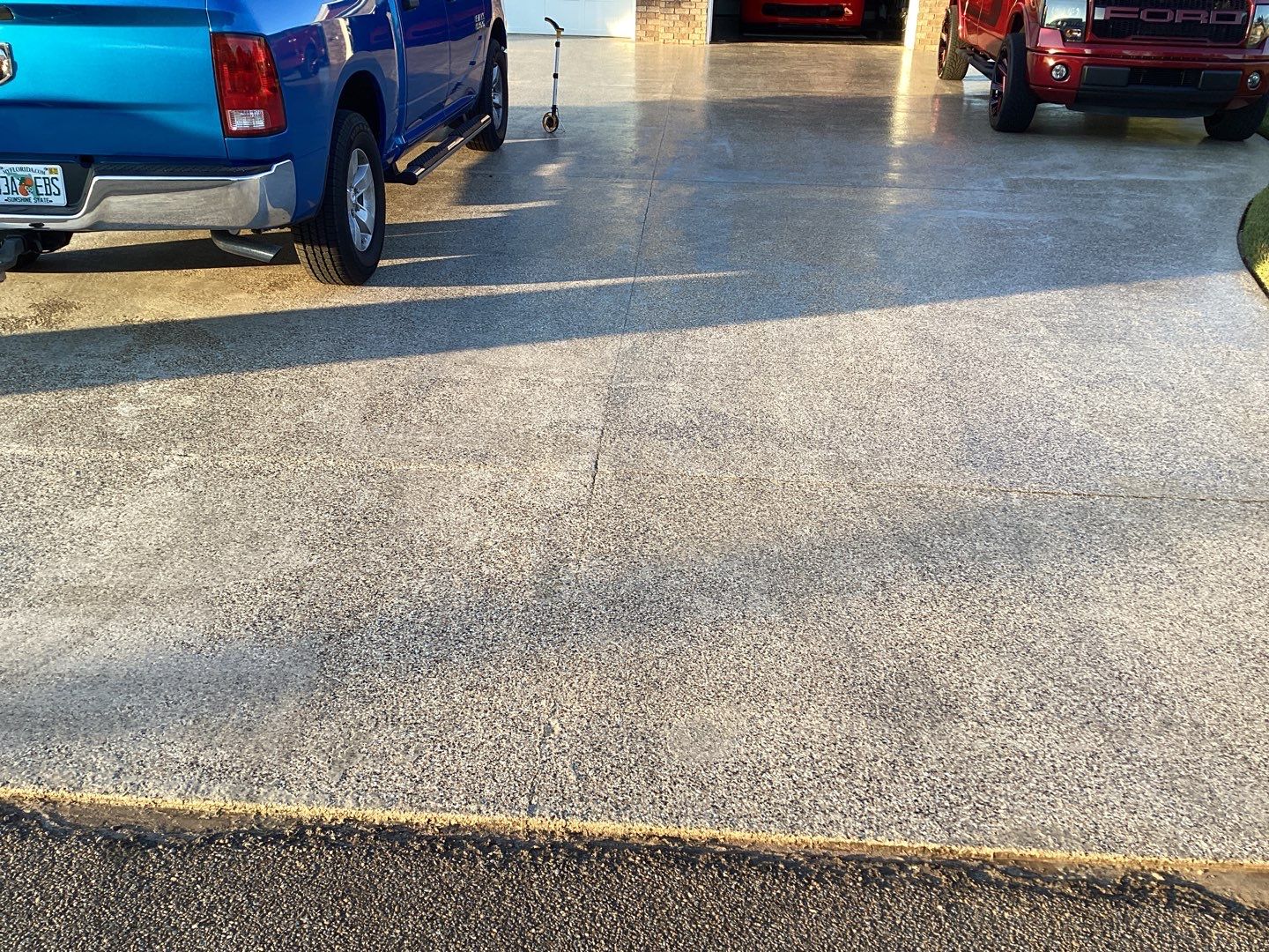 Dynamic Domato Driveway by Deese Elite Concrete Coatings