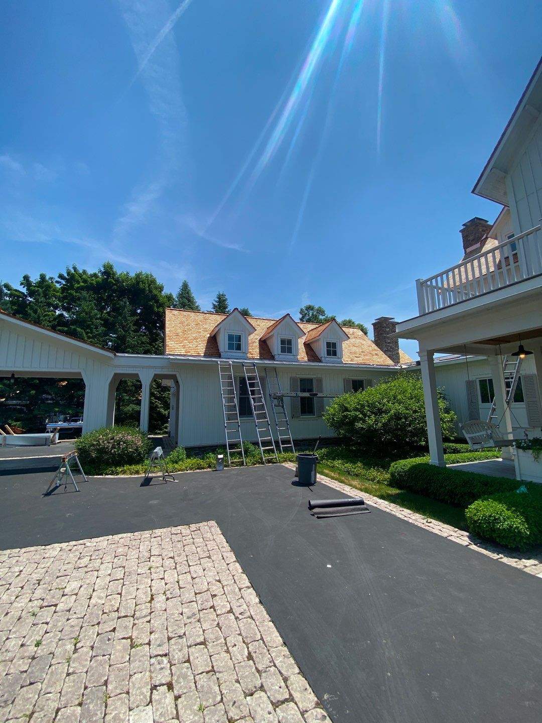 Cedar Shake Roof Replacement with Half Round Gutter Installation by Custom Installations
