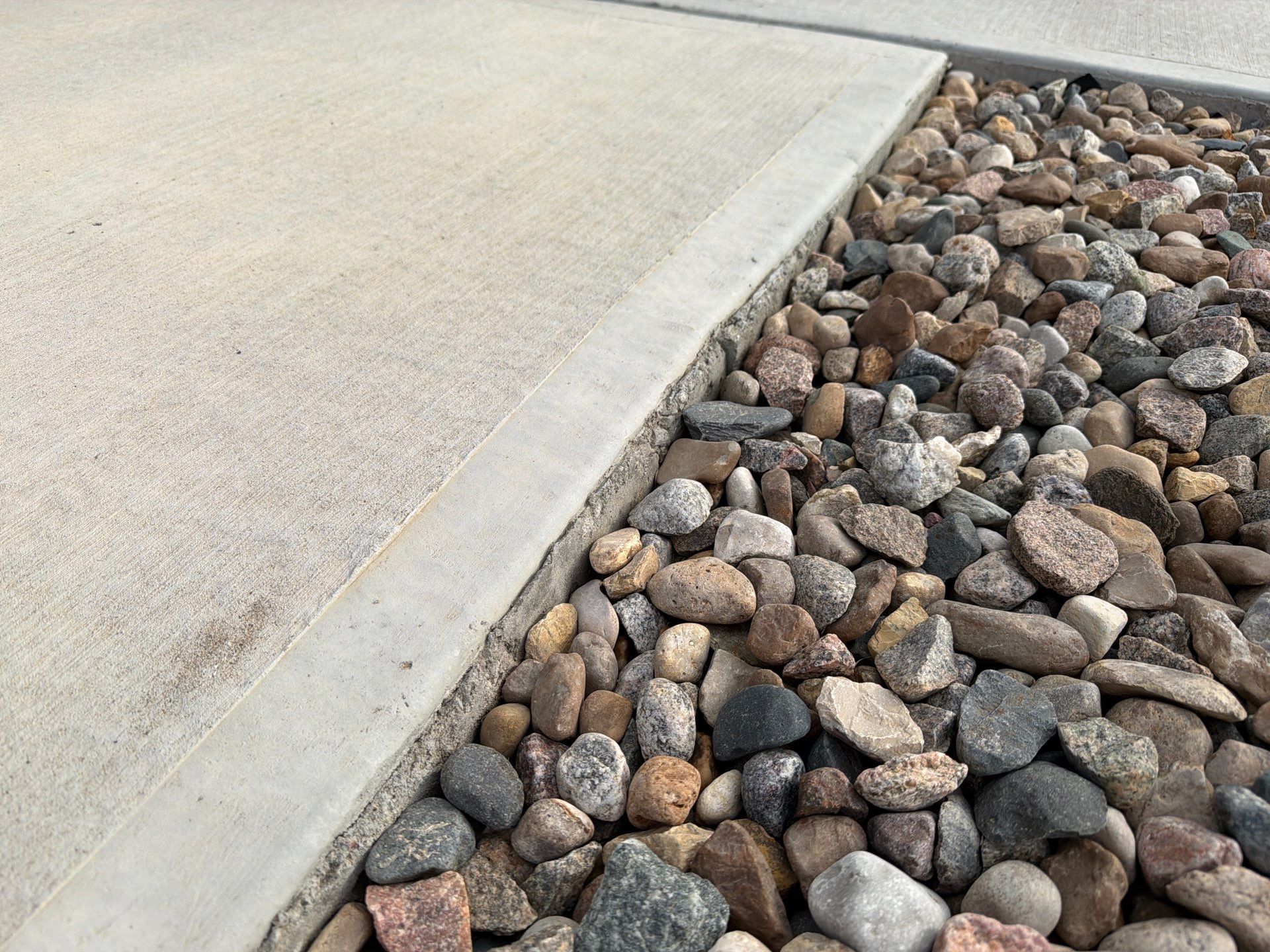 Decorative Flake Concrete Coating for Sioux Falls Porch and Patio by Select Painting, Coatings & Garage Cabinets