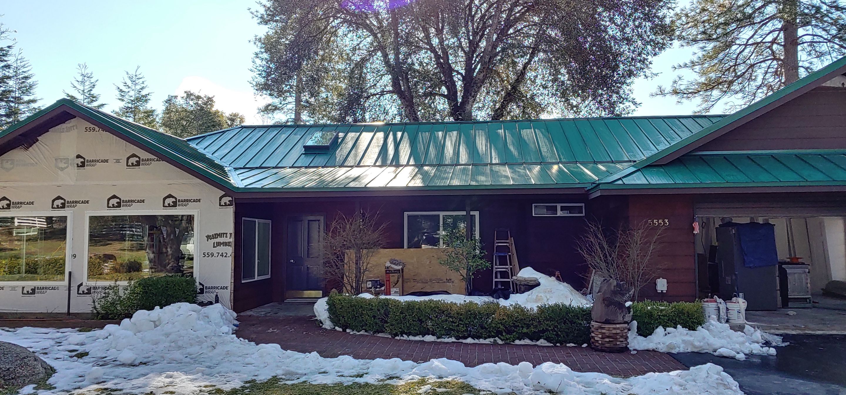 Metal roofing installation using Standing seam metal roofing system by Straight Edge Roofing Inc