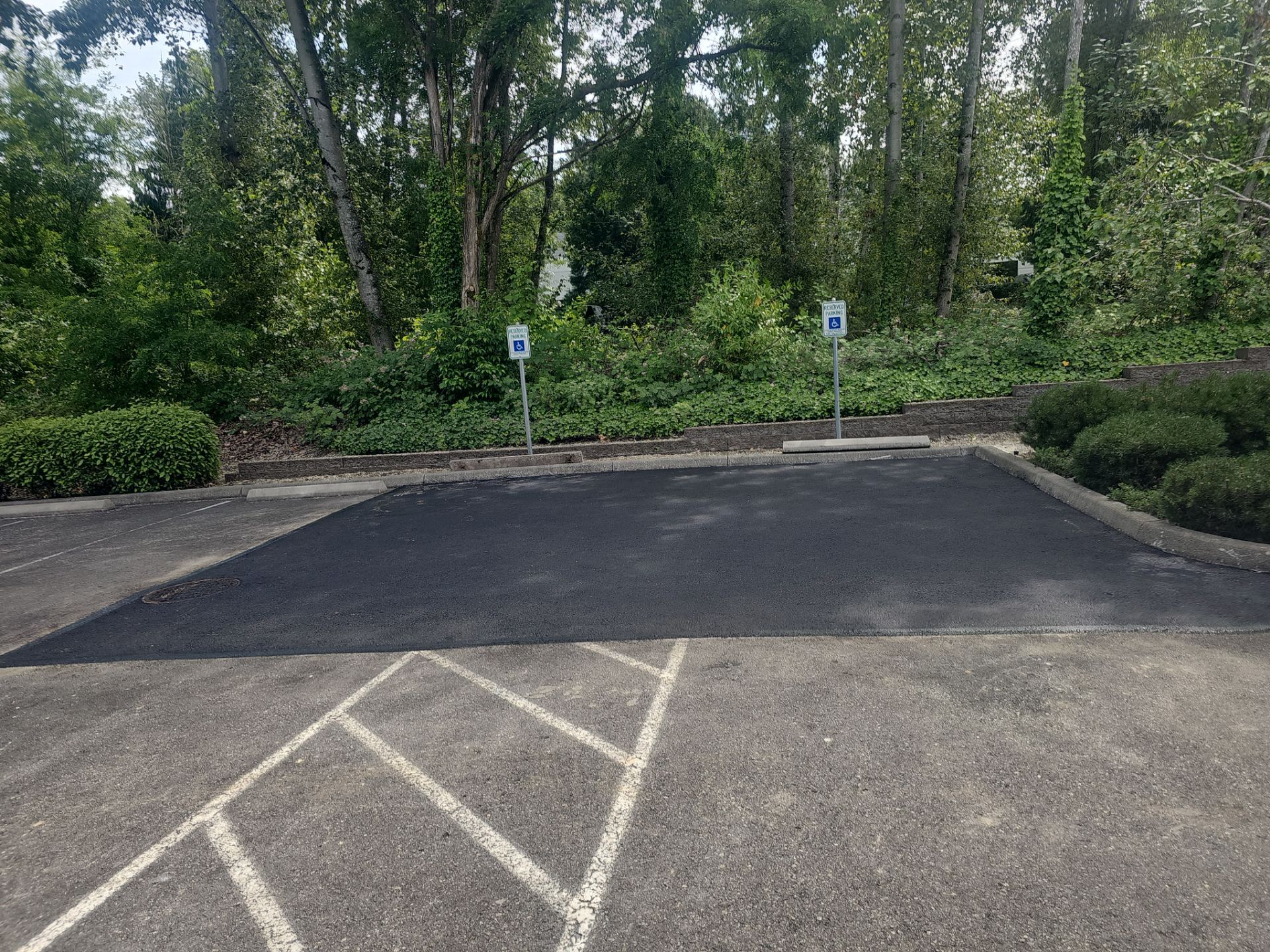 Asphalt Patch Repair & Concrete Curb Renovation | Kirkland  by Jireh Asphalt & Concrete Inc 