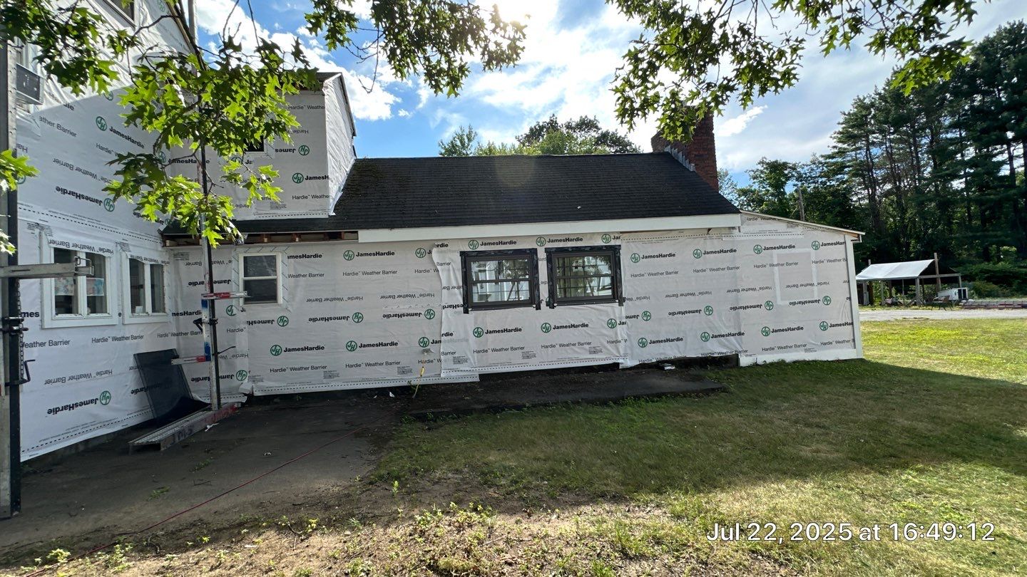 James Hardie Lap Siding Installation in Chelmsford, MA by Mighty Dog Roofing of Greater Middlesex County