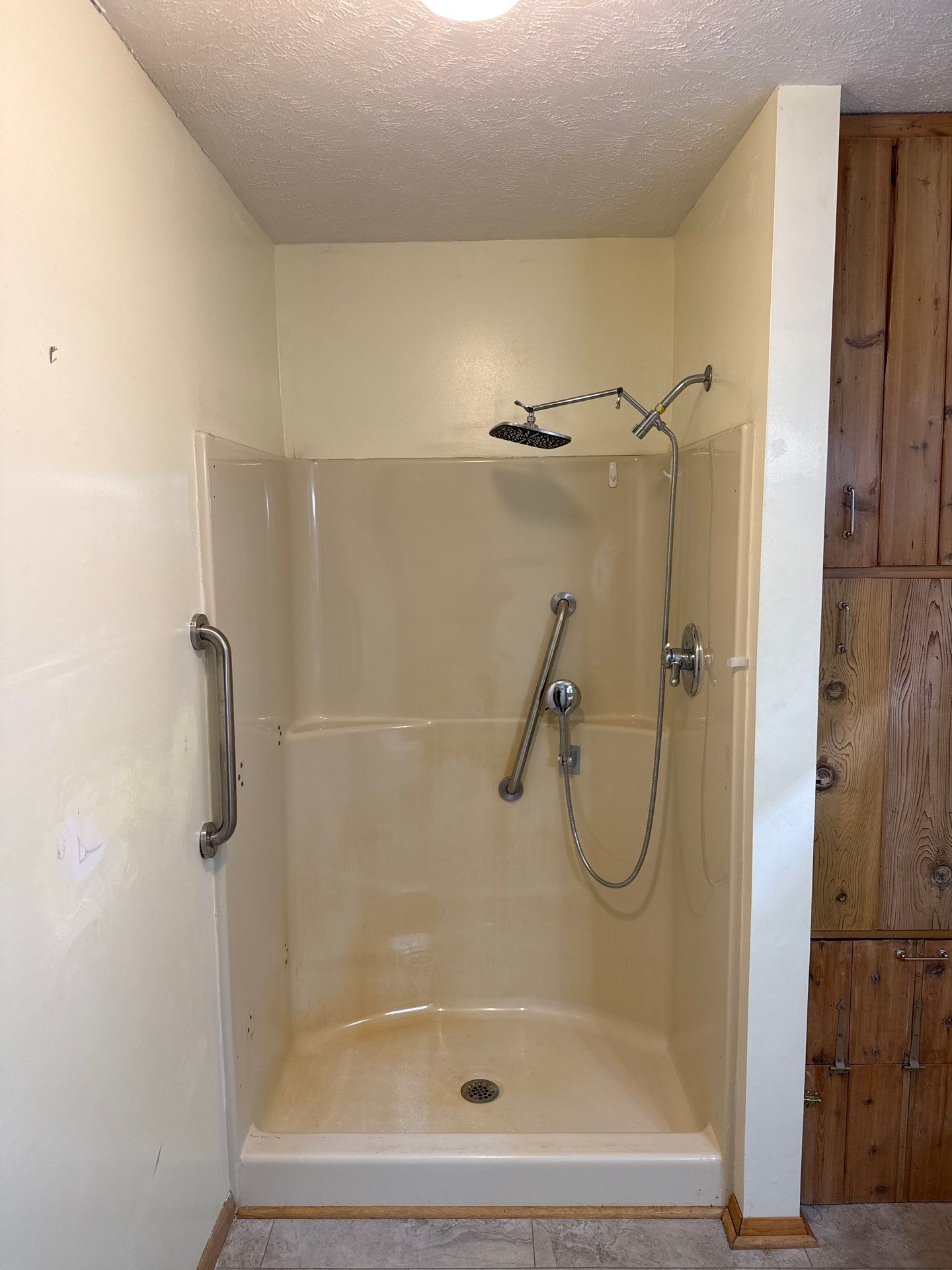 Modern Jacuzzi Walk-In Shower Remodel with Glass Doors in Cedar by Rainbow Seamless Systems