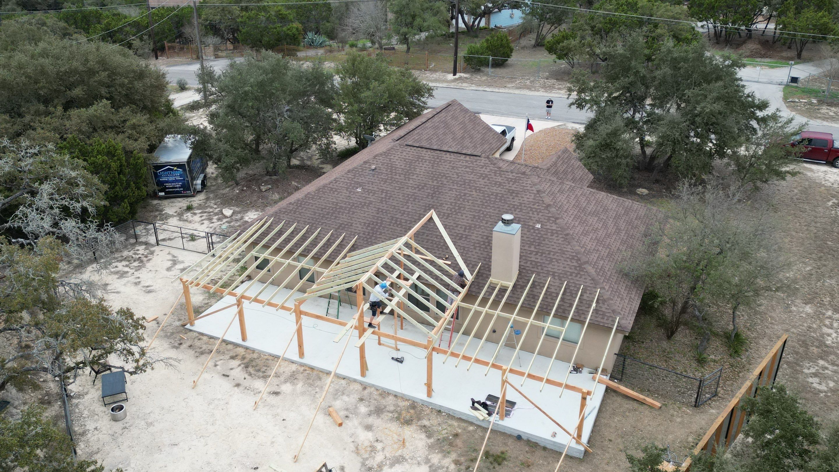 Reroof with Back Patio Addition using Owens Corning Duration Aged Copper by Lightning Exteriors