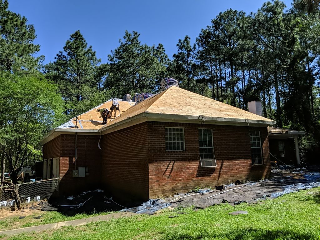 Residential Roofing Installation using Roof Replacement by American Roofing & Construction LLC