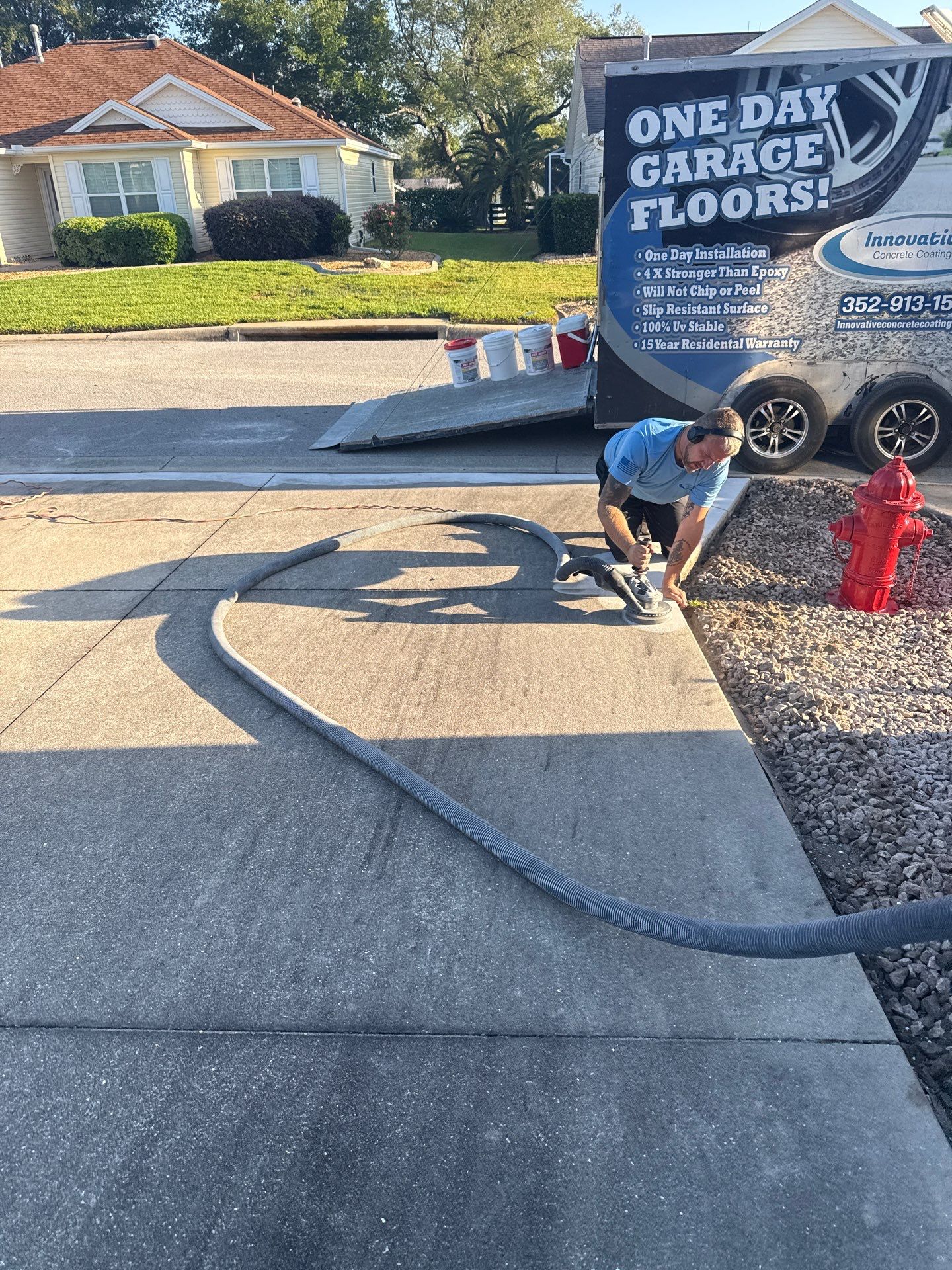 Garage, Drivewat, and Sidewalk in Landshark and Tidalwave by Innovative Concrete Coatings 