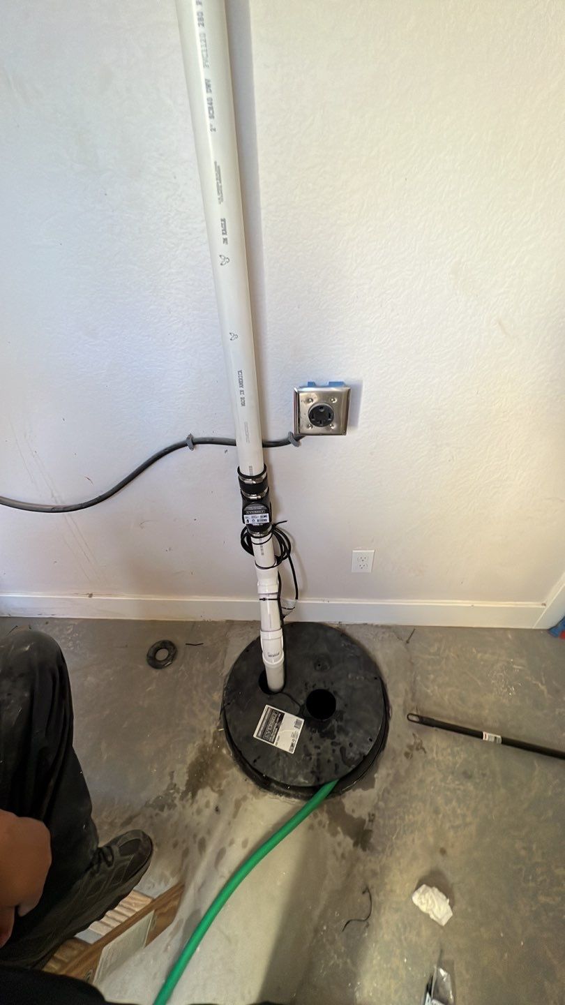 Basement Sump pump/pit by Plumbing Connect Systems LLC