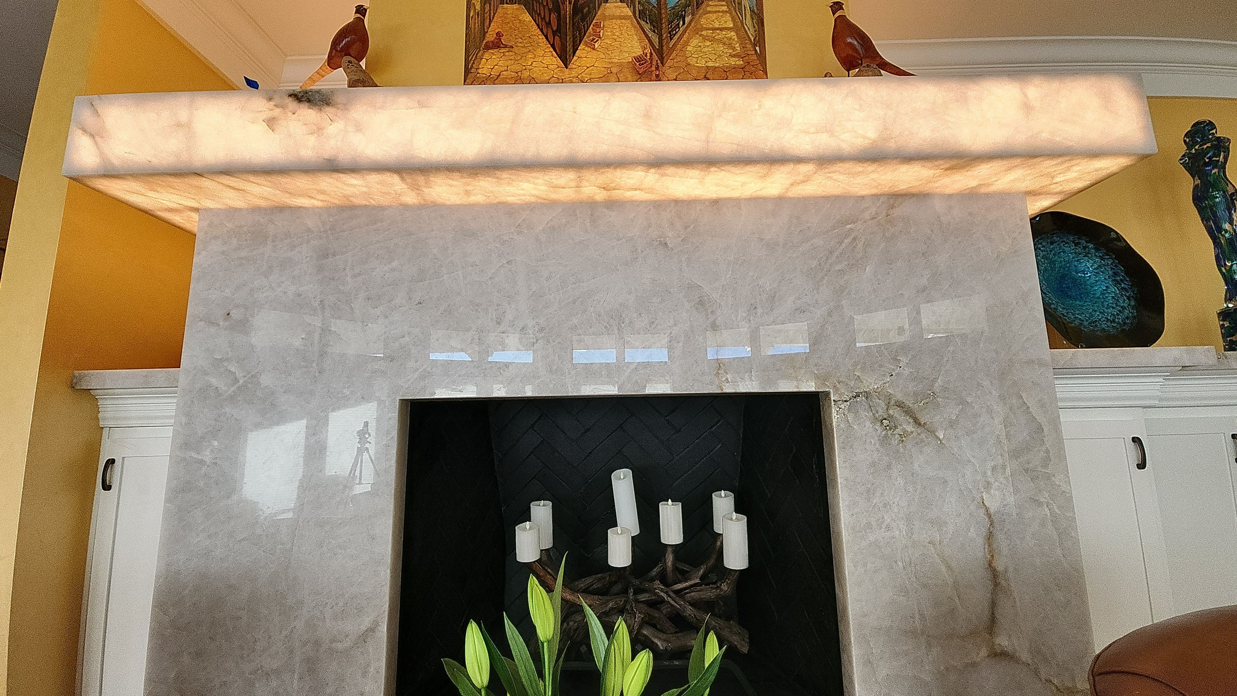 Backlit Stone On A Fireplace by S.Y. Electric Inc.