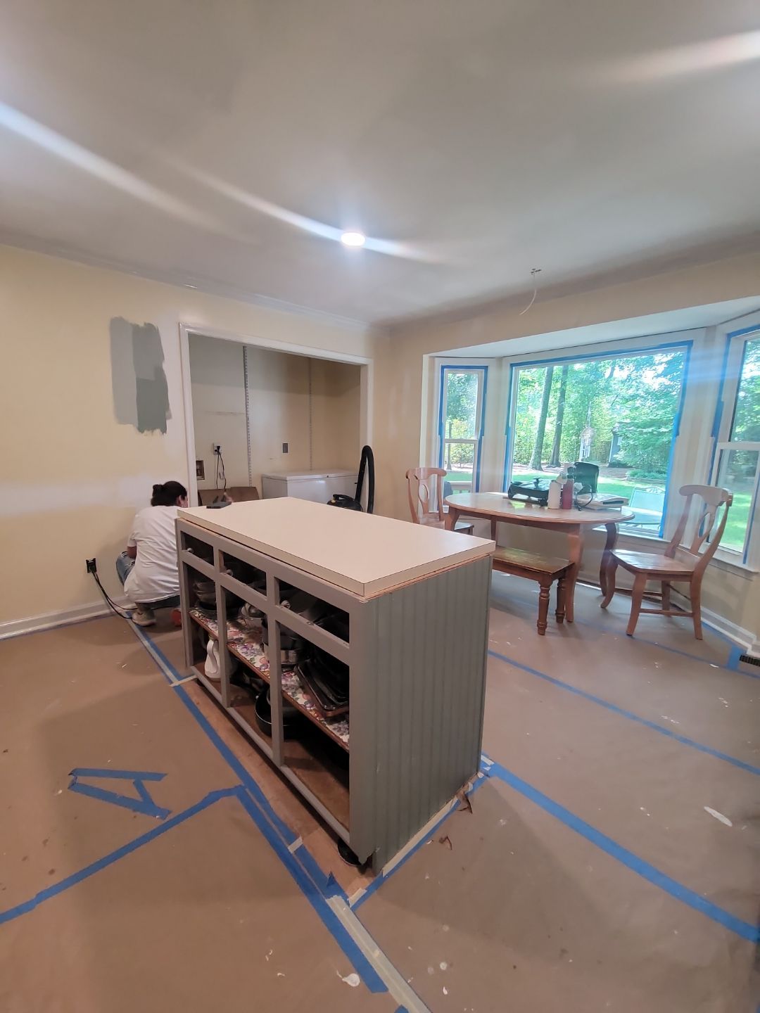 A Pathway to Personality – A Two-Tone Kitchen Transformation in Apex by Elite Remodeling and Design LLC