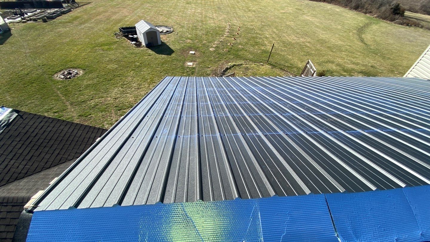 Residential Roofing Installation using Performance Panel Metal - Frost Black by RoofX 