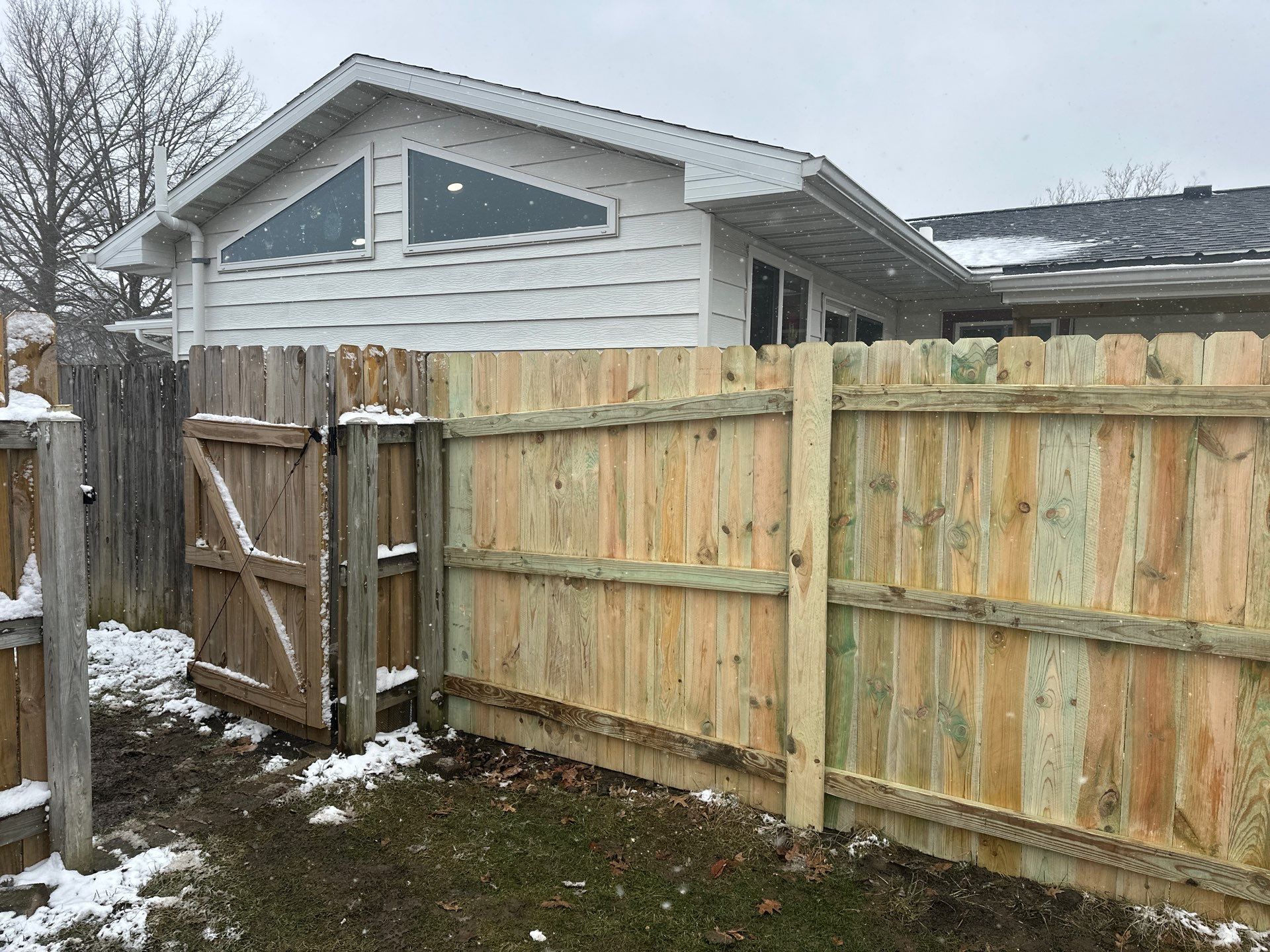 Pressure-Treated Wood Privacy Fence Replacement in Waterloo by Perfect Picket Fence and Stain