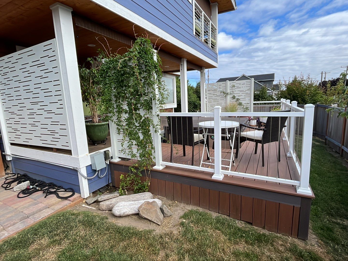 Deck Extension with Hideaway Screen by Alki deck builders 