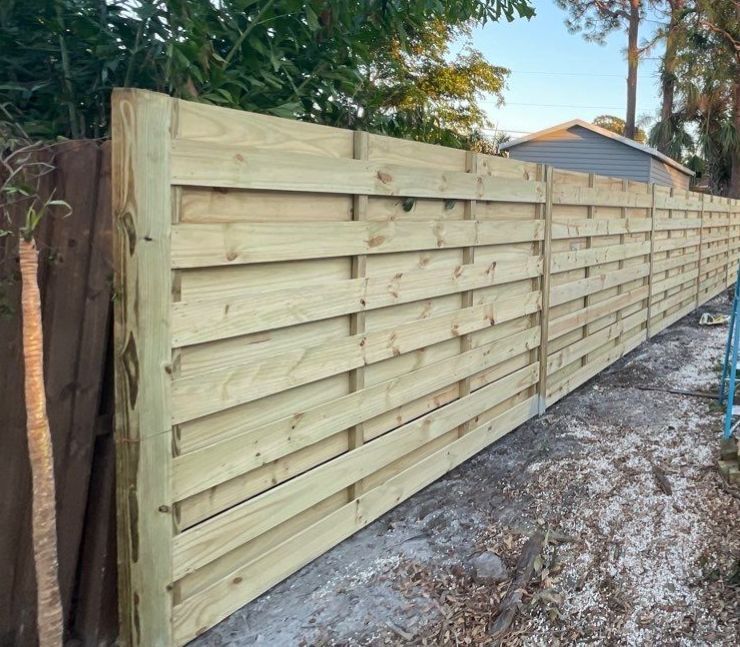 Wood Fence Installation using Horizontal Shadowbox Wood Privacy Fence by Asap fence and gates, LLC