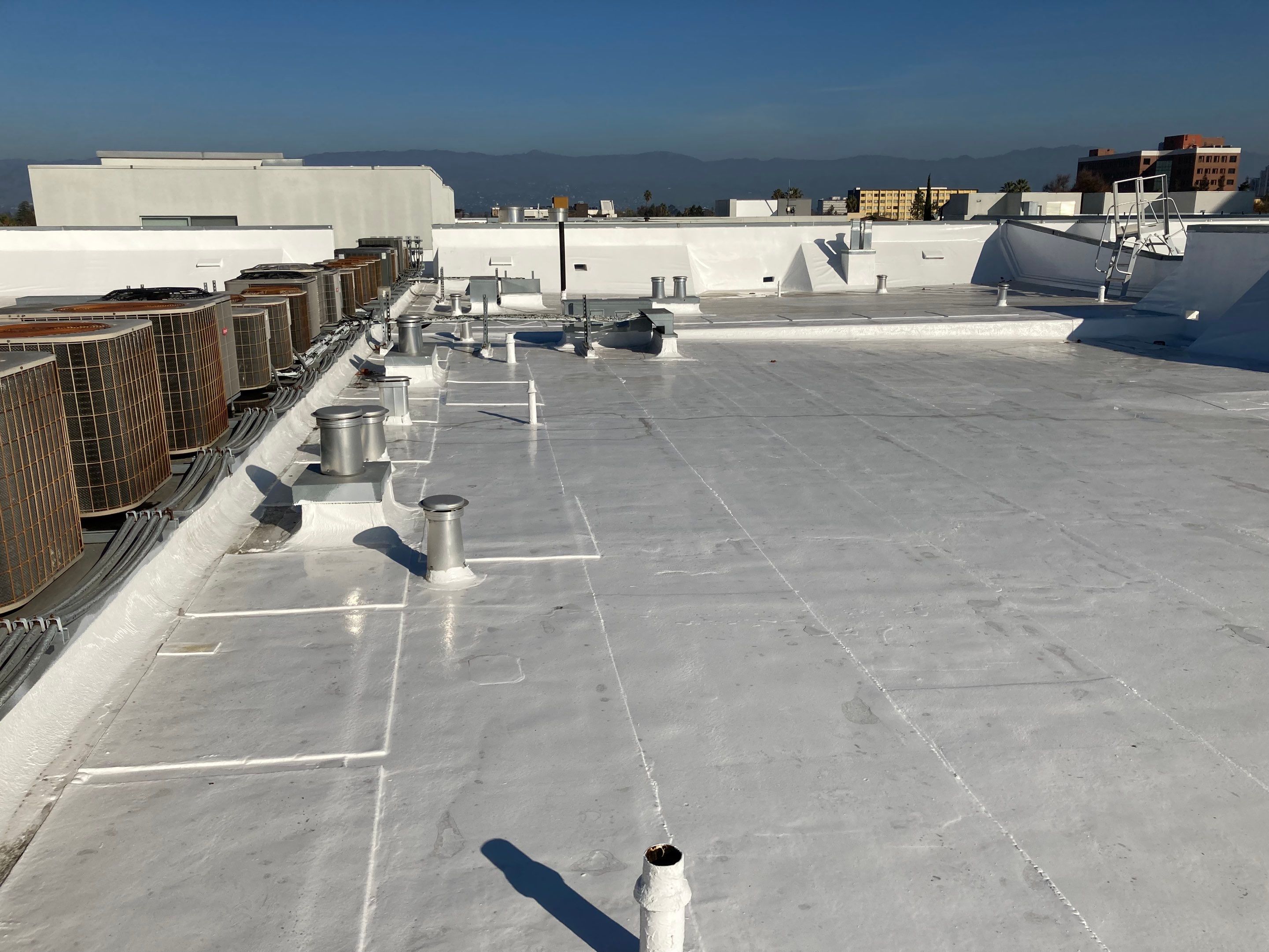 Commercial Flat Roof Repair and Reflective Silicon Coating in San Jose by Eastman Roofing & Waterproofing Inc.