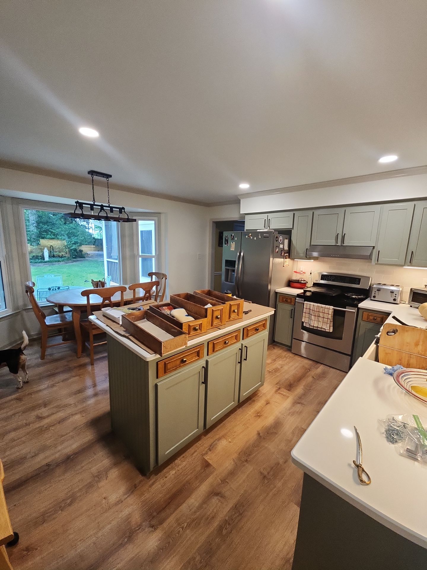 A Pathway to Personality – A Two-Tone Kitchen Transformation in Apex by Elite Remodeling and Design LLC