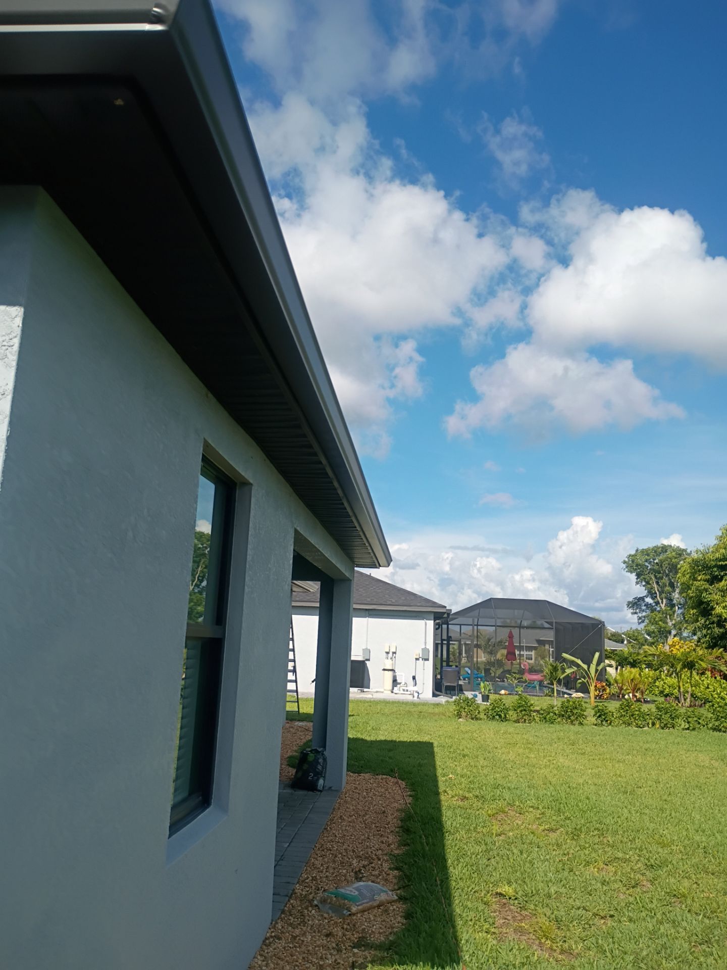 Dark Bronze Seamless Gutters using 6 Inch Seamless Gutters in Cape Coral FL by Gutter Professors