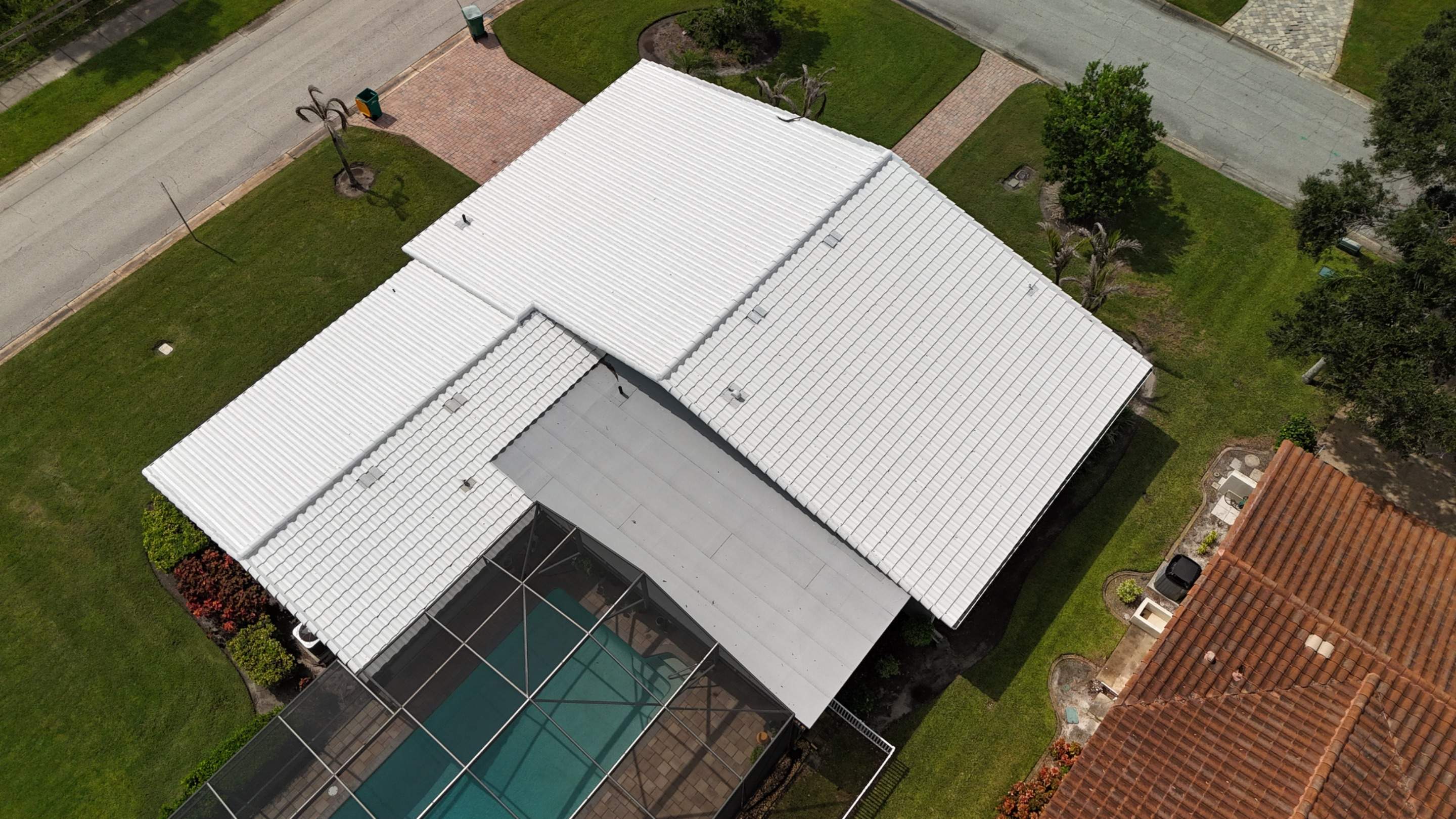 Comprehensive Concrete Tile and Flat Membrane Roof Replacement in Cocoa Beach