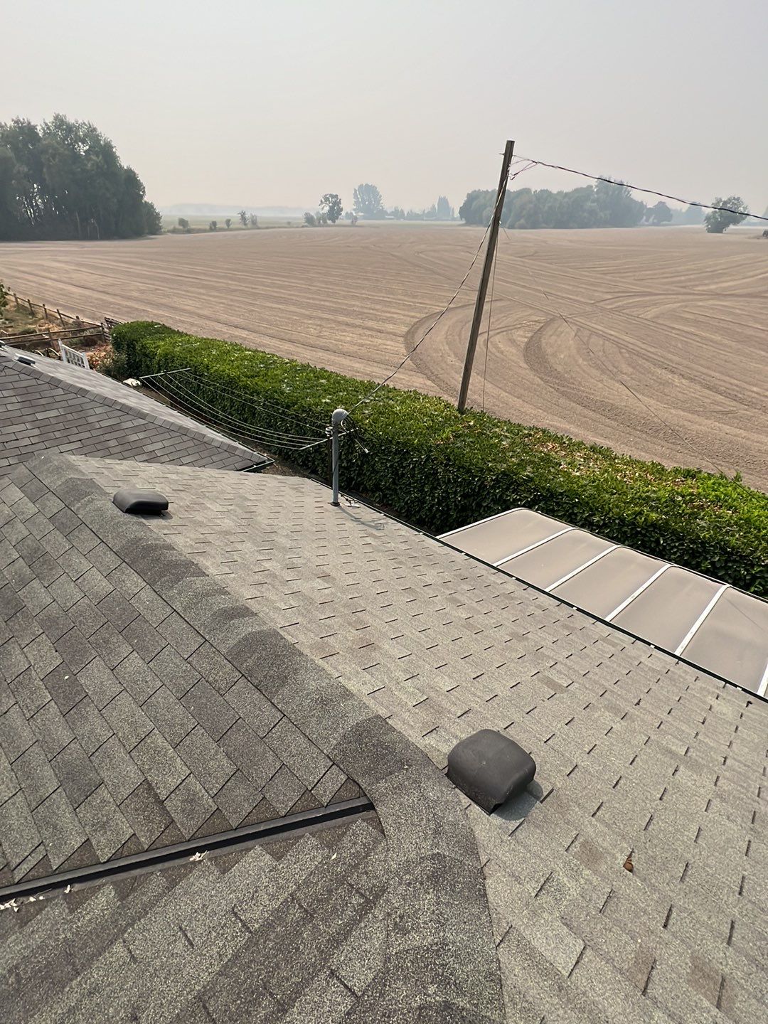 Residential Roofing Installation using IKO Dynasty (Color: Granite Black) by Orezona Building & Roofing Company, Inc.