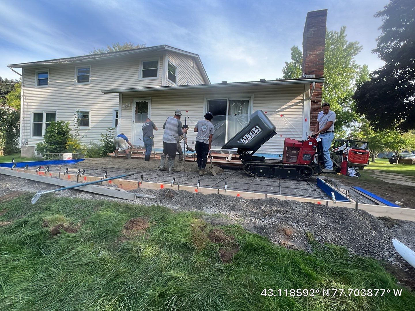 Bluestone textured stamped concrete patio by NG Masonry & Construction LLC