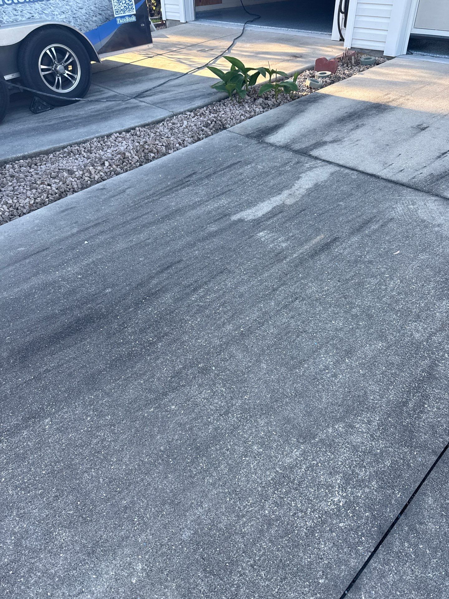 Garage, Drivewat, and Sidewalk in Landshark and Tidalwave by Innovative Concrete Coatings 