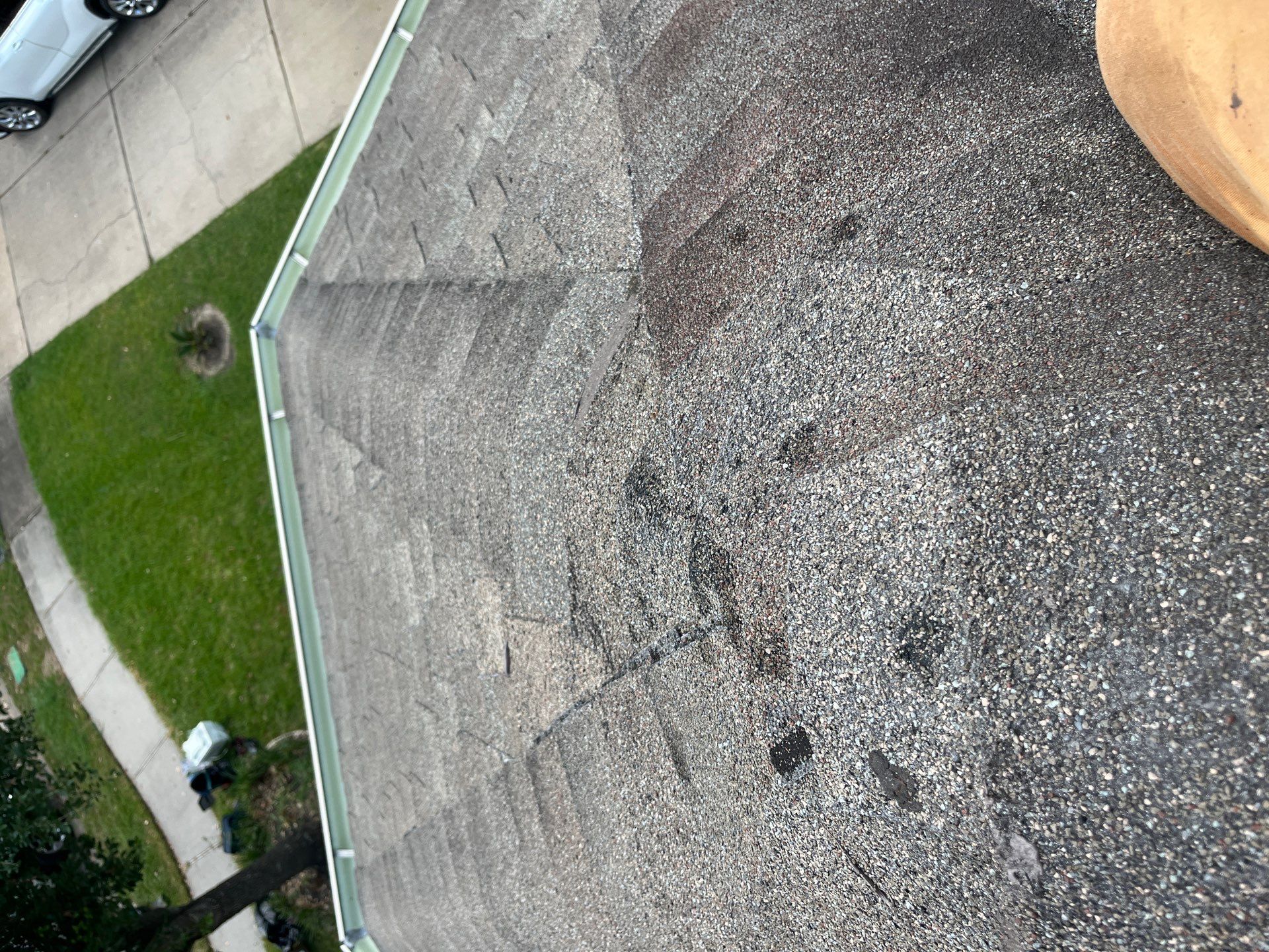 Hail Damage using Owen's Corning Duration (Lifetime) Shingles by Roof Repair Company