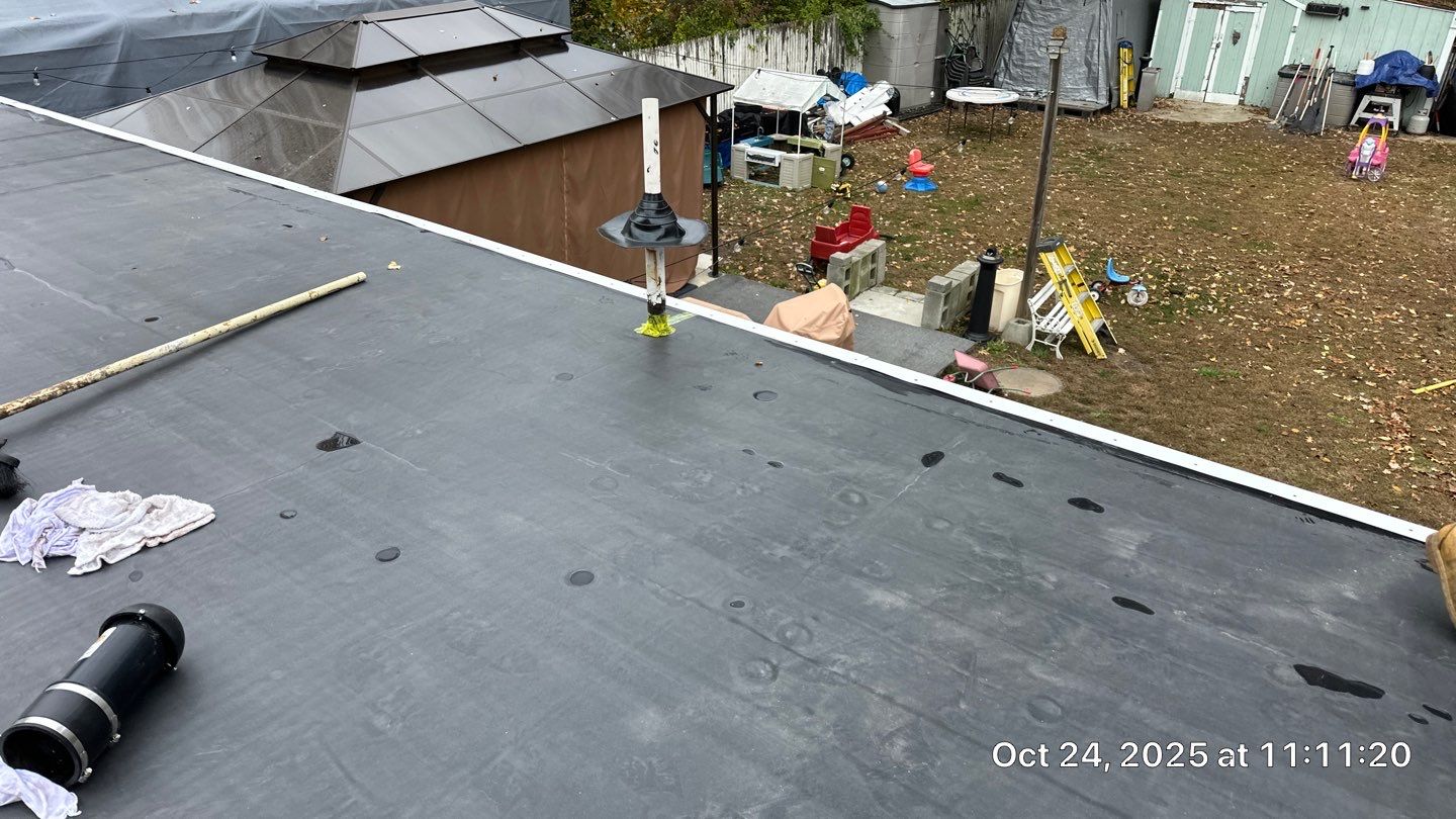 Westford EPDM Flat Roof with Gutter & Soffit/Fascia Replacement by Mighty Dog Roofing of Greater Middlesex County