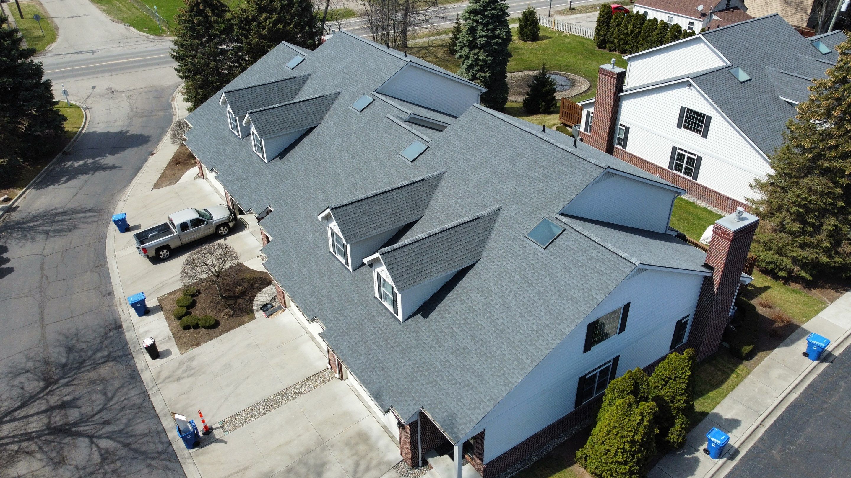 Condo Association Roof Replacement using GAF Shingles by Bloomfield Construction & Restoration
