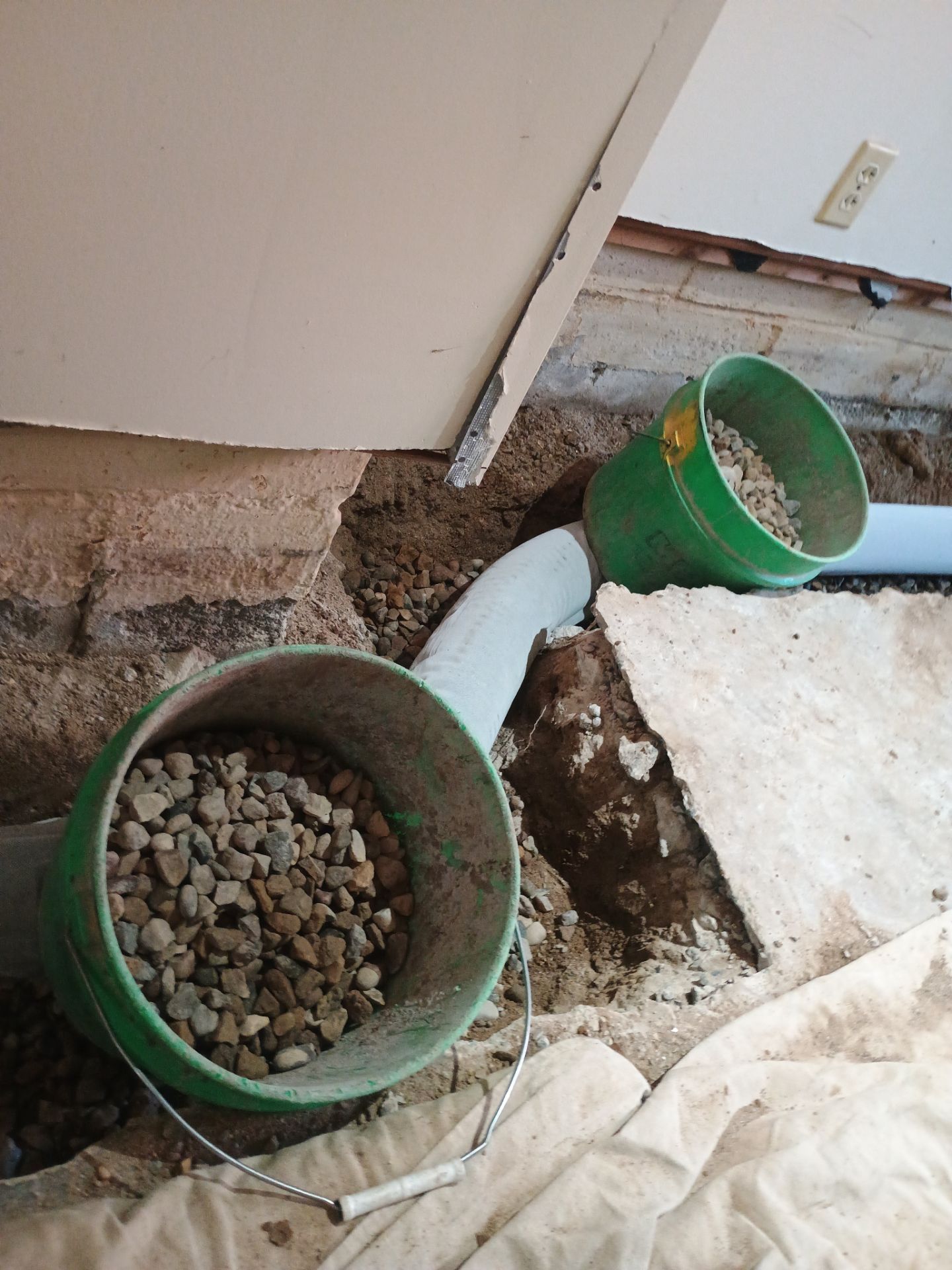 Completing the Connection for Lisa's Drain Tile System by Waterproofing Northeast