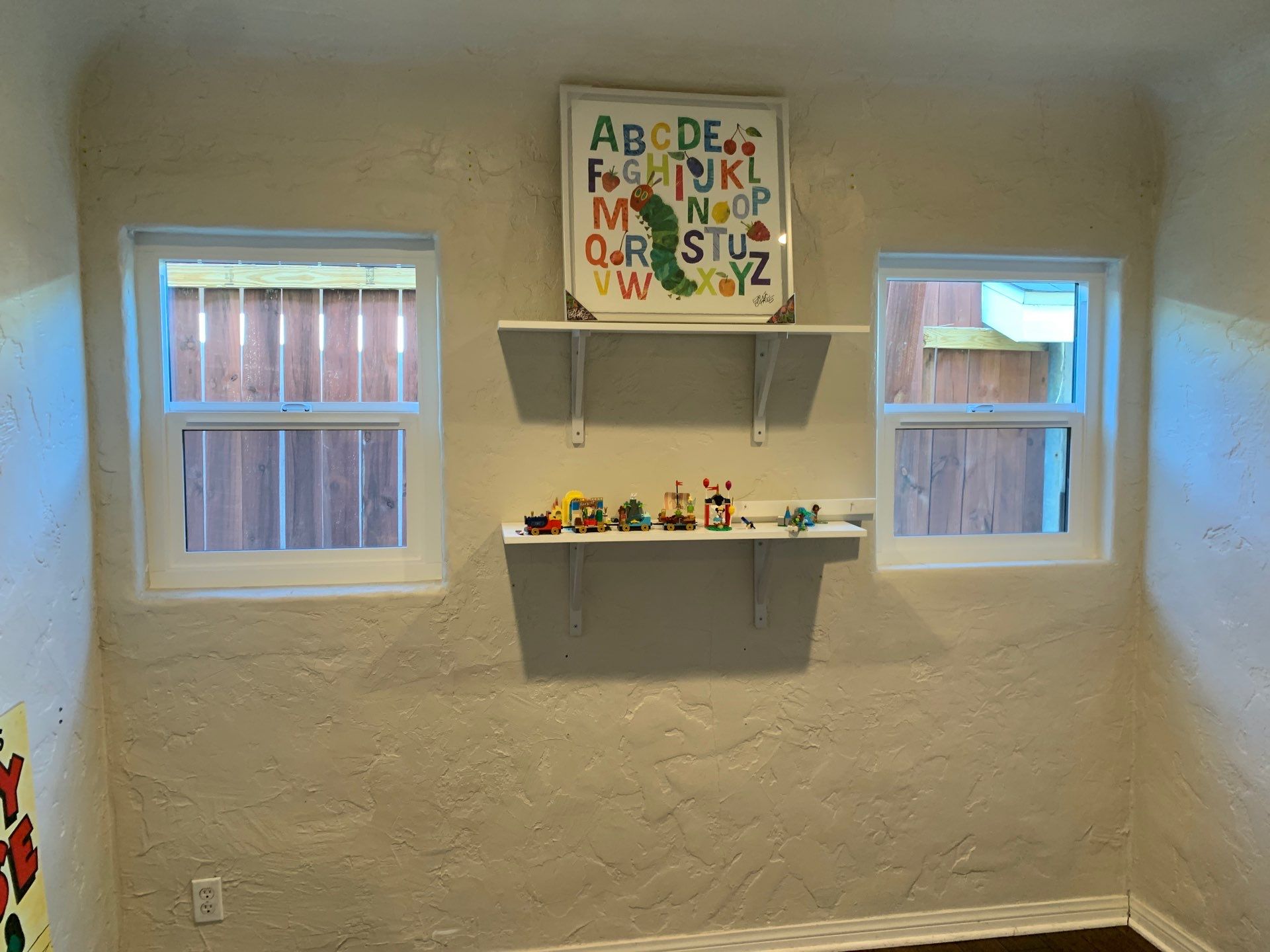 Window Installation using Black Anlin windows by American Window Company