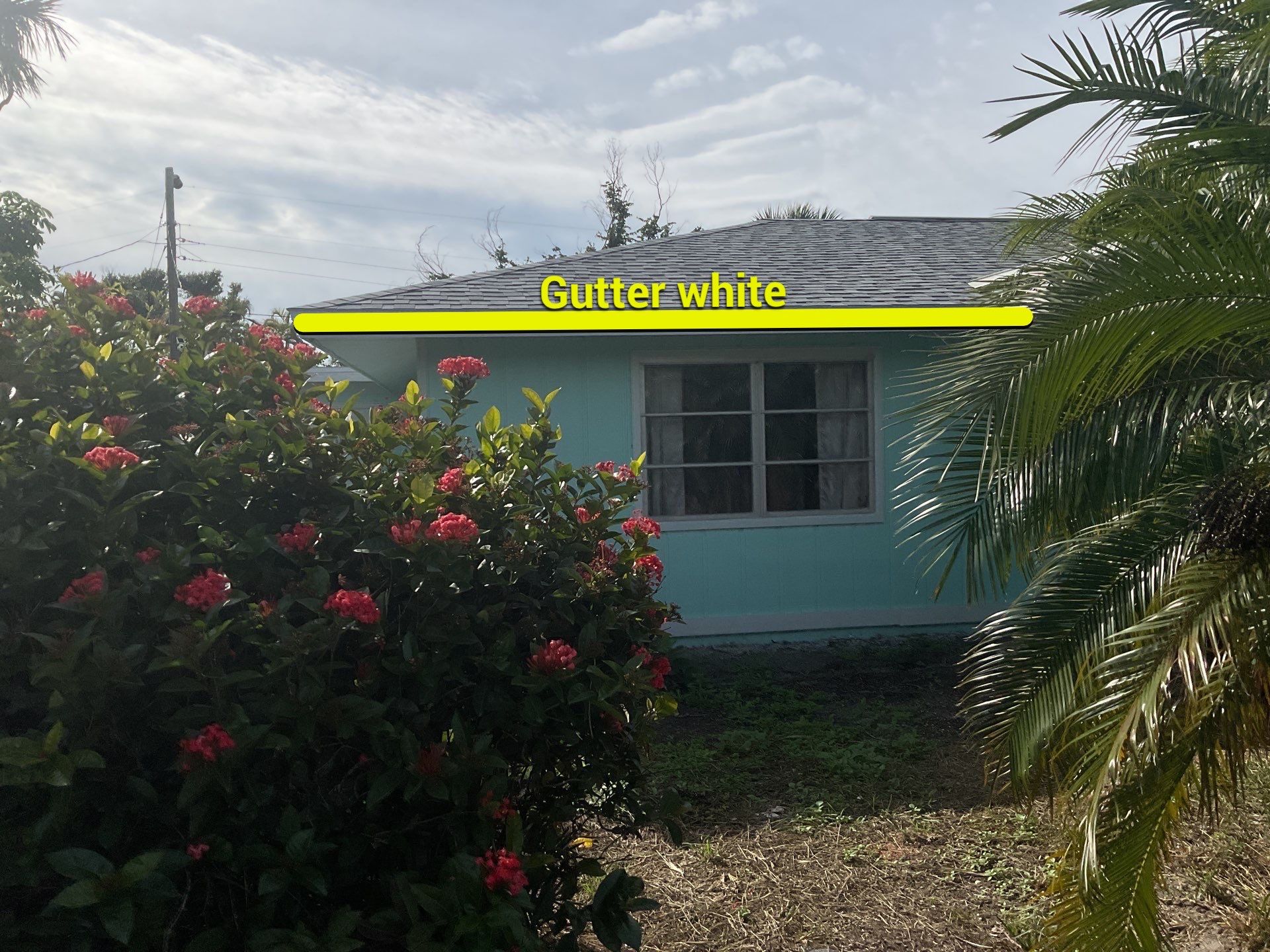White Seamless Gutters Installation in Sanibel FL by Gutter Professors